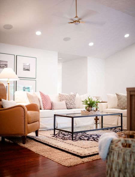 Leather recliner. Glass coffee table. Jute rug. Living room design.  

#LTKHome #LTKFamily #LTKSaleAlert