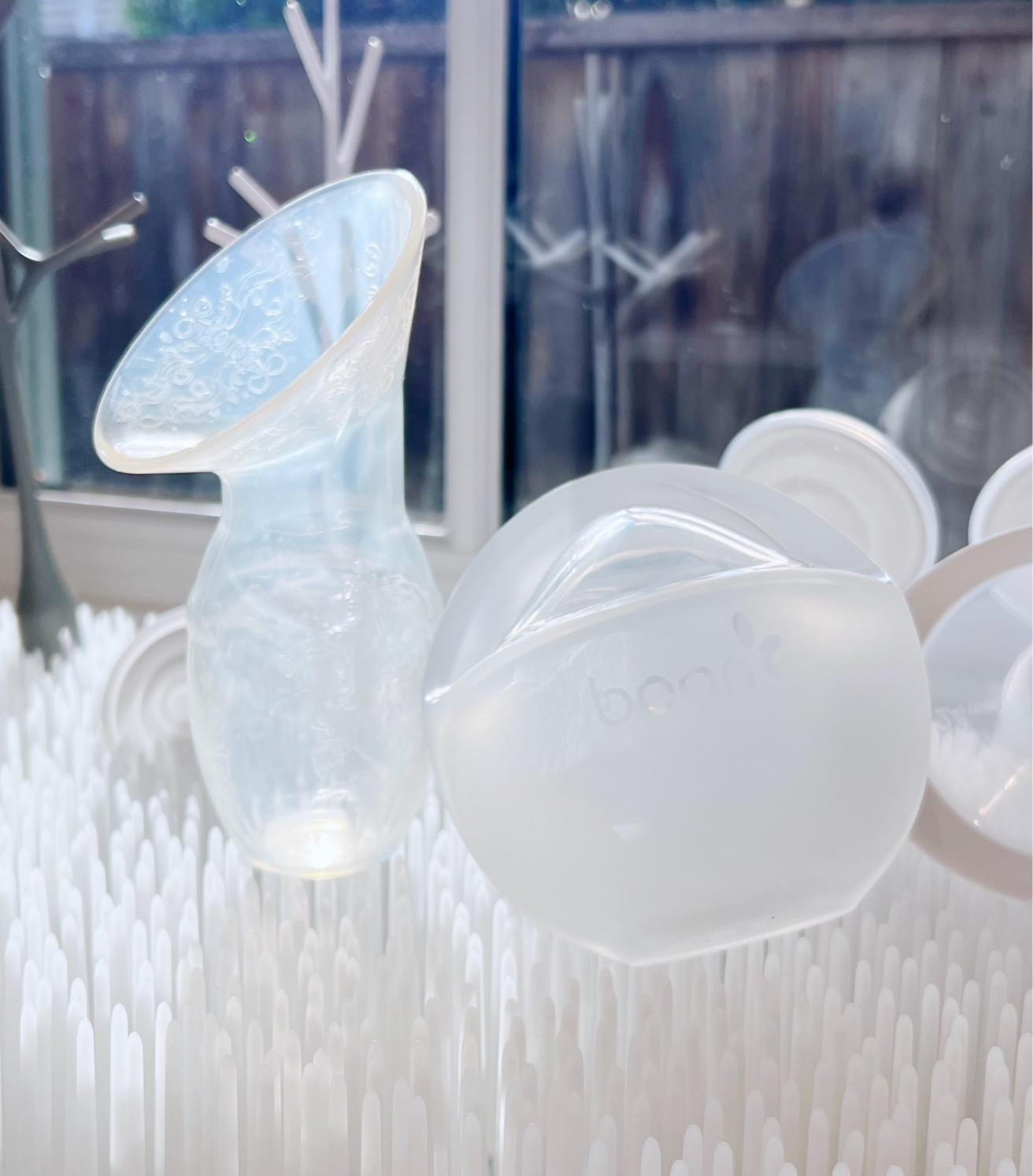 Two Milk Catchers and what I think about them - the Haaka is great when I have a stubborn, clogged duct. I put hot water in it and allow the steam and pull of the Haaka work it out. The Trove fits into my nursing bra and isn’t easily knocked off while I am nursing.

#LTKBaby #LTKFamily