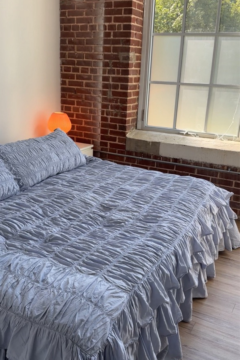 the bedding of my dreams 🧚🏼✨ ruffled duvet from Anthropologie in ‘dusty blue’ & lamp from West Elm
#duvet #bedding #roomdetails 

#LTKStyleTip #LTKSeasonal #LTKHome