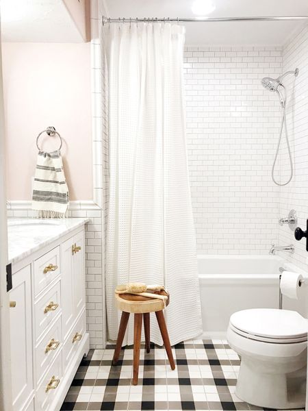 In case you're looking for a refresh, I rounded up a bunch of our favorite shower curtains below. While I've gone classic white before in our previous home pictured above, I ordered the Pottery Barn one for our home now as I'm just loving that traditional blue & white combination!

#LTKfindsunder50 #LTKhome #LTKSeasonal