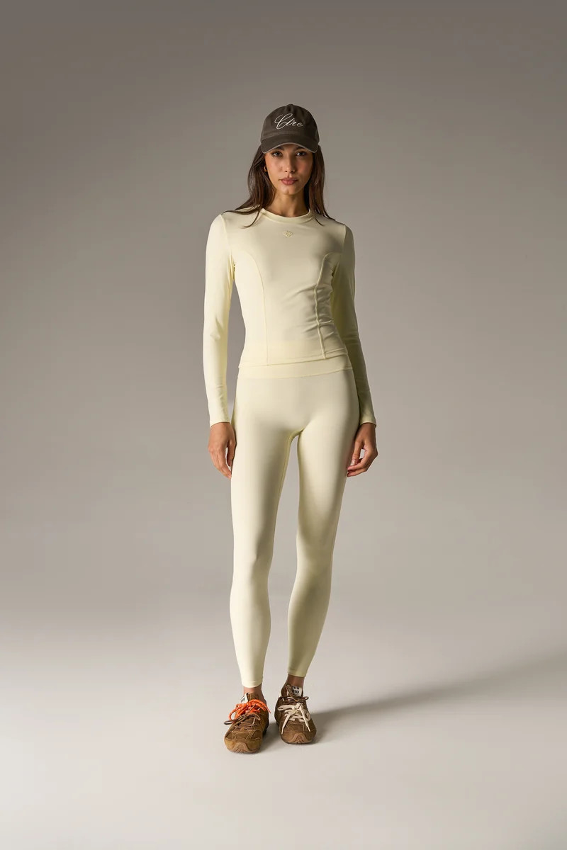 SCULPTING STRETCH EMBLEM LEGGINGS - YELLOW | The Couture Club