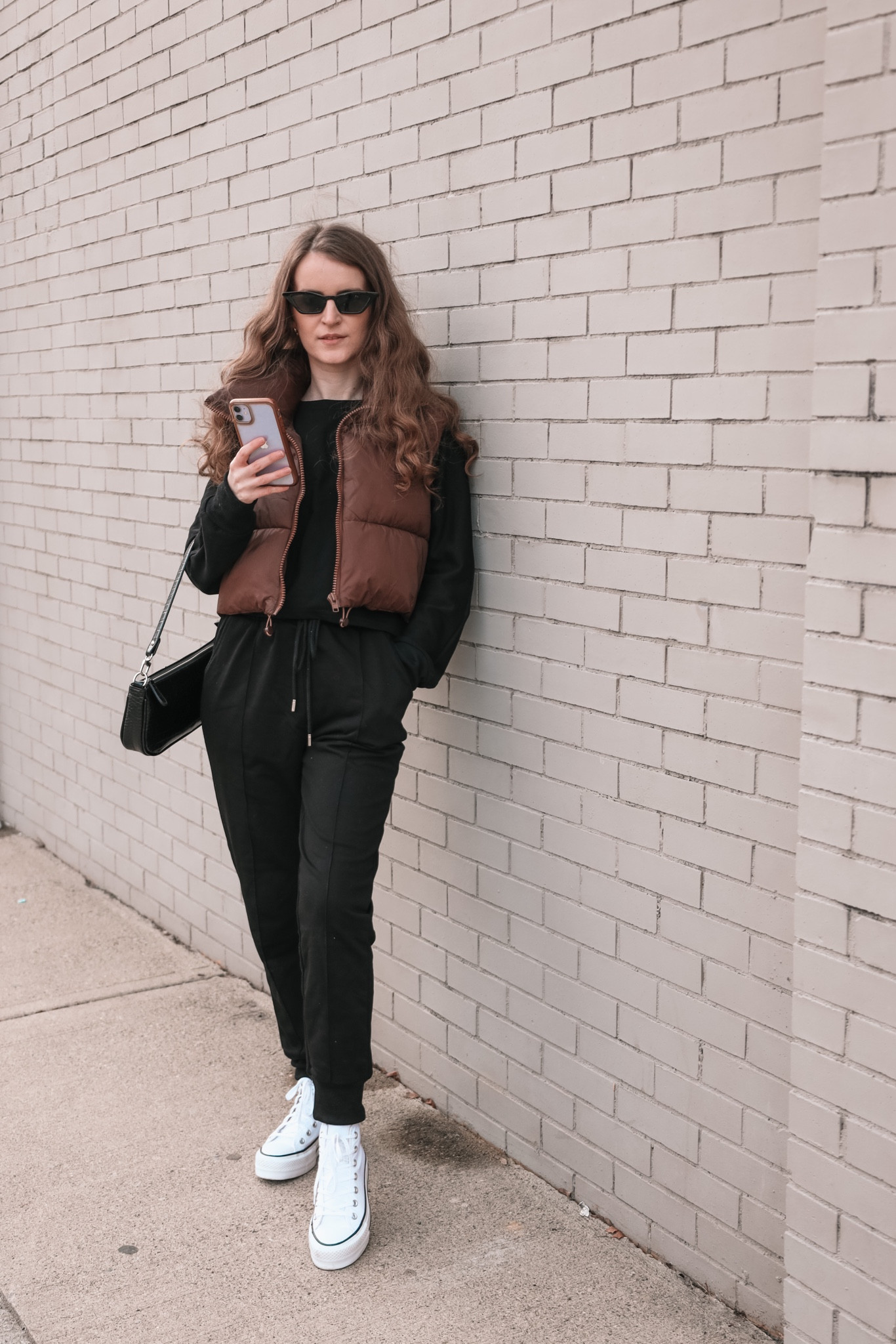 A puffer vest paired with a matching sweatpant set, converse sneakers and shoulder bag makes a cute casual fall outfit. 
.
.
.
.
.
.#LTKunder50 #LTKCyberWeek3 #LTKholiday #LTKunder100 #LTKitbag #LTKshoecrush #LTKsalealert #LTKstyletip #LTKtravel #LTKfit #LTKcurves 

Fall outfits | matching sets | amazon fashion | amazon finds | vest outfit | sweatpants outfit | casual outfits | puffer vest amazon | athleisure | black sweatshirt | sweatshirt outfit | puffer vest outfit | brown puffer vest | cropped puffer vest | converse platform | converse high tops | fall bags | fall shoes | 

#LTKSeasonal #LTKGiftGuide #LTKU