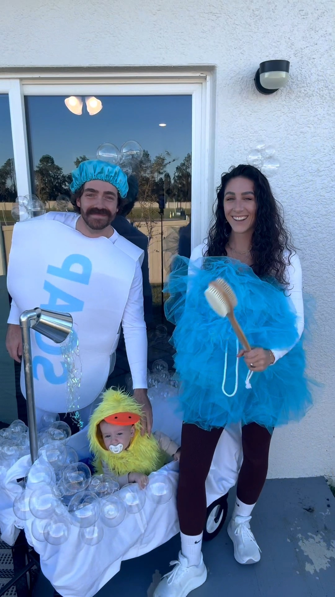 Our little rubber ducky in her bath time fun. The wagon couldn’t have turned out better 🫧🛁 those balloons were an absolute pain in my butt to blow up but they made the perfect bubble replicas. 
.
.
#partyballoons #balloons #bubbleballoons #diyhalloween #halloweendiy #diywagon #familyof3 #familycostume #rubberducky #rubberduck #rubberduckcostume #firsthalloween

#LTKParties #LTKKids #LTKSeasonal
