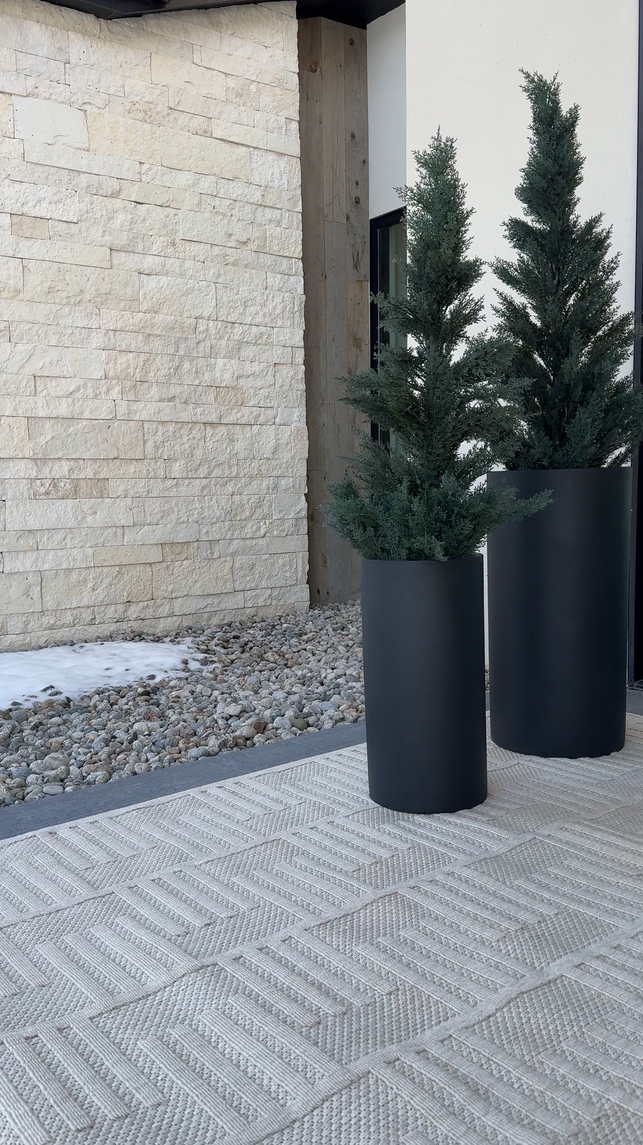 Love these sleek modern planters and the neutral rug. This timeless combo can be used year round.

#LTKVideo #LTKstyletip #LTKhome