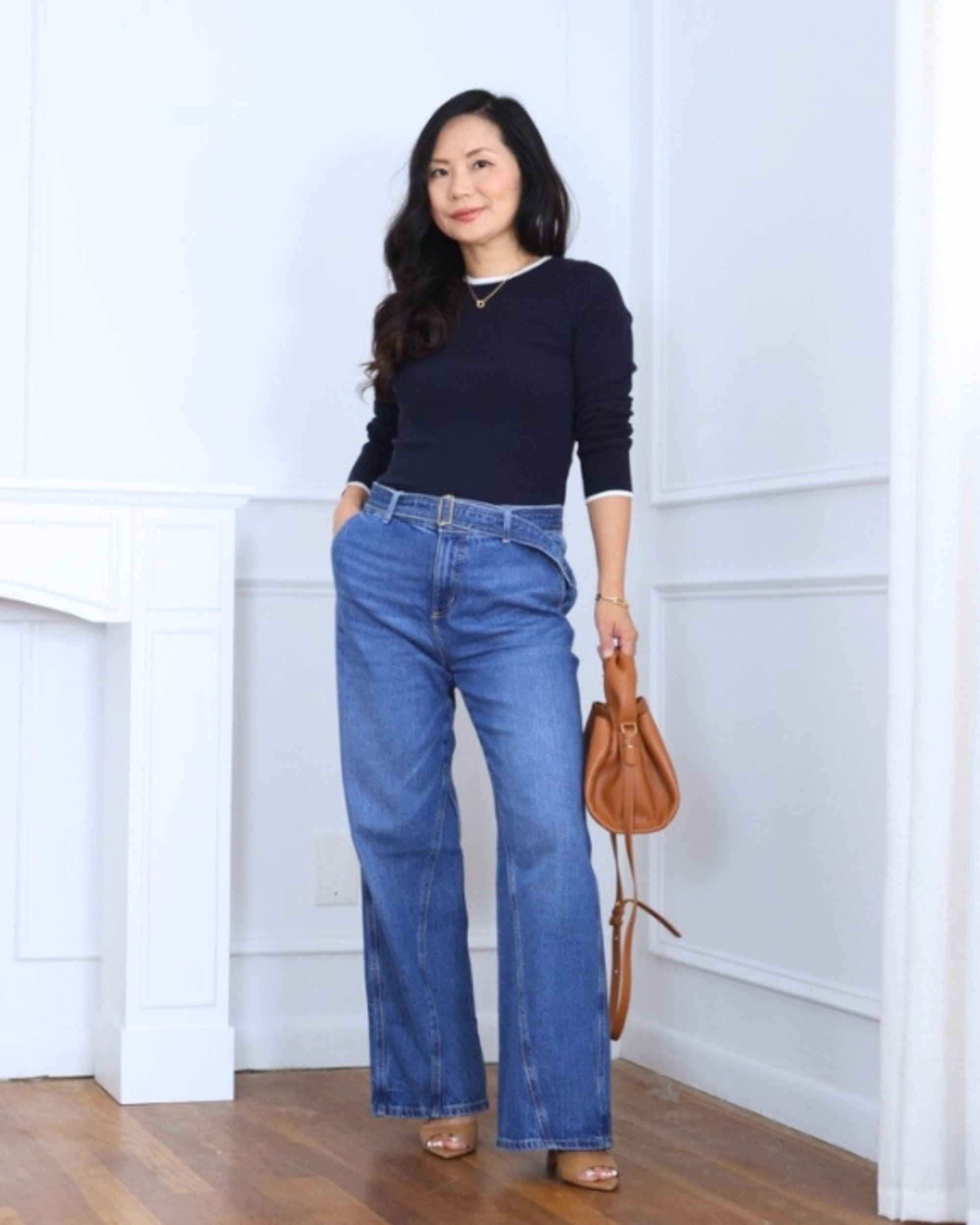 This navy sweater from H&M is such a comfy piece that still feels put-together. I paired it with wide-leg belted jeans from Loft for a relaxed shape, then added a bag from Quince to finish the look—simple, polished, and easy to wear. I’m 5’2, wearing size S.

#LTKPetite #LTKOver40 #LTKStyleTip