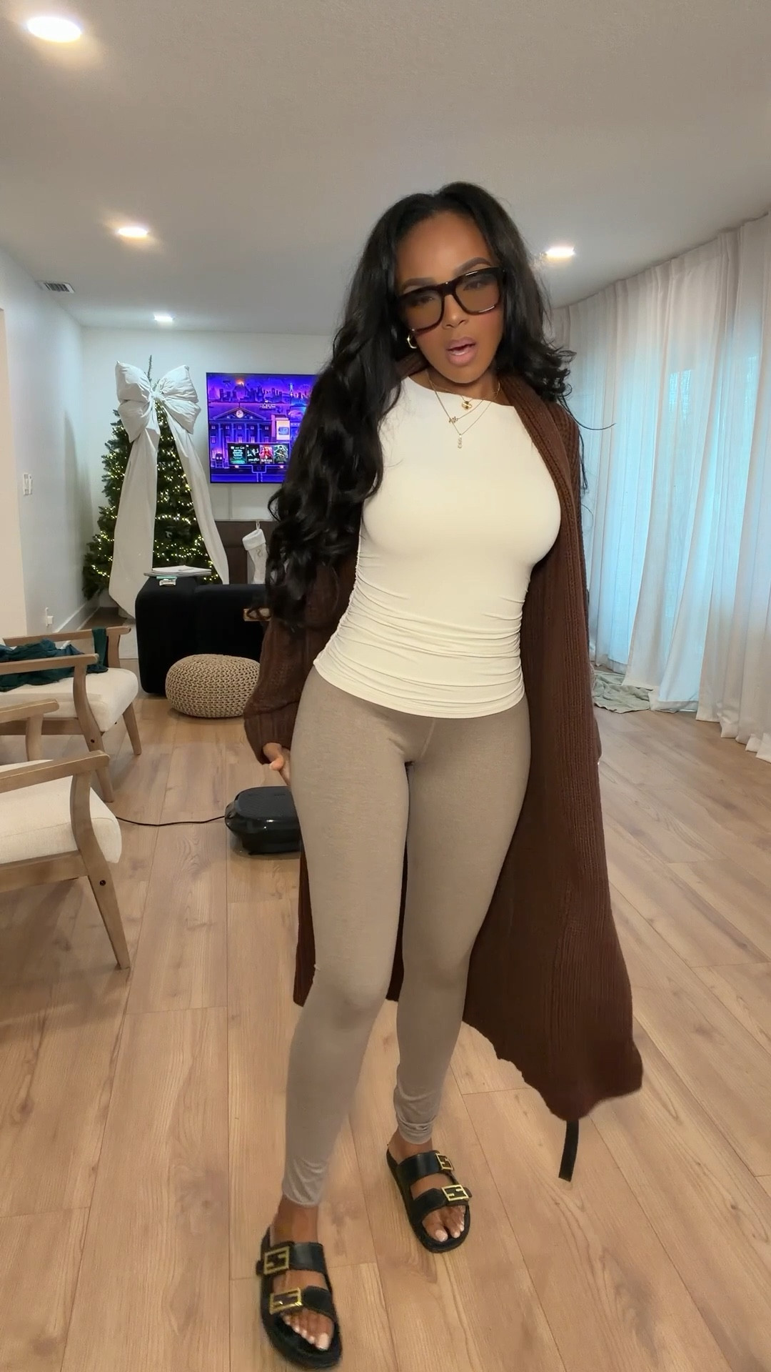 ✨ Effortless Off-Duty Layers
A cozy, everyday look built around flattering basics and neutral tones. The fitted white top and soft leggings create an easy base, while the long brown cardigan adds warmth and polish. Finished with comfy slides for that relaxed but put-together vibe.

Perfect for errands, casual days, travel, or lounging in style.

Tap to get details and shop everything instantly.

📏 Sizing: Top (Small) • Leggings (Small) • Cardigan (Small) • Sandals (TTS)  
Measurements: 5'4" • 138 lbs • 34D • 27” waist • 40” hips

Casual neutral outfit, everyday leggings look, cozy cardigan outfit, off-duty style, neutral capsule wardrobe, comfy chic outfit ideas.

Follow me on Instagram and YouTube @kirasfashionfinds

#LTKootd #LTKgrwm