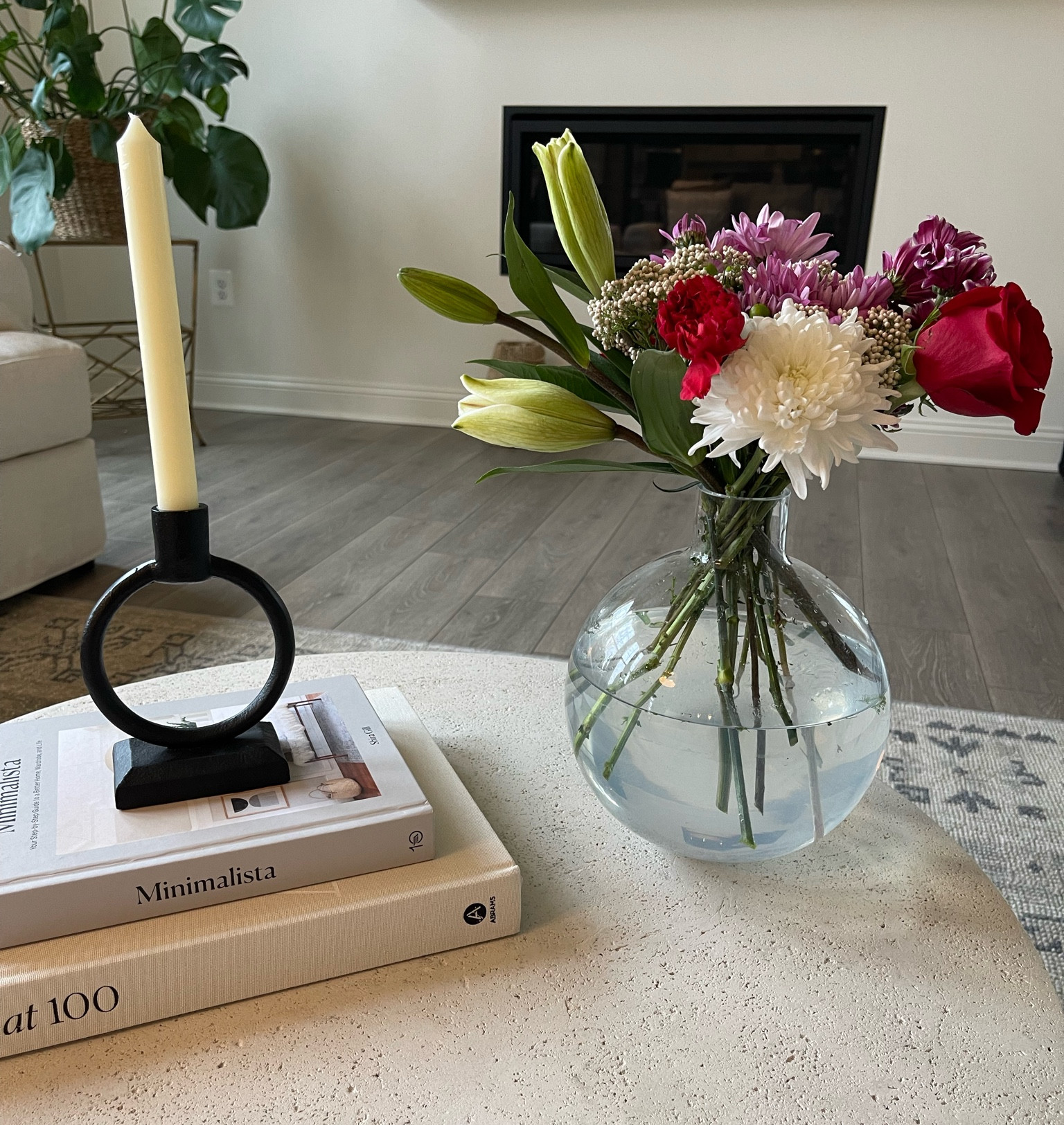 Glass vase
Spring flowers
Coffee table
Candle stick
Candle holder
Coffee table books

#LTKhome