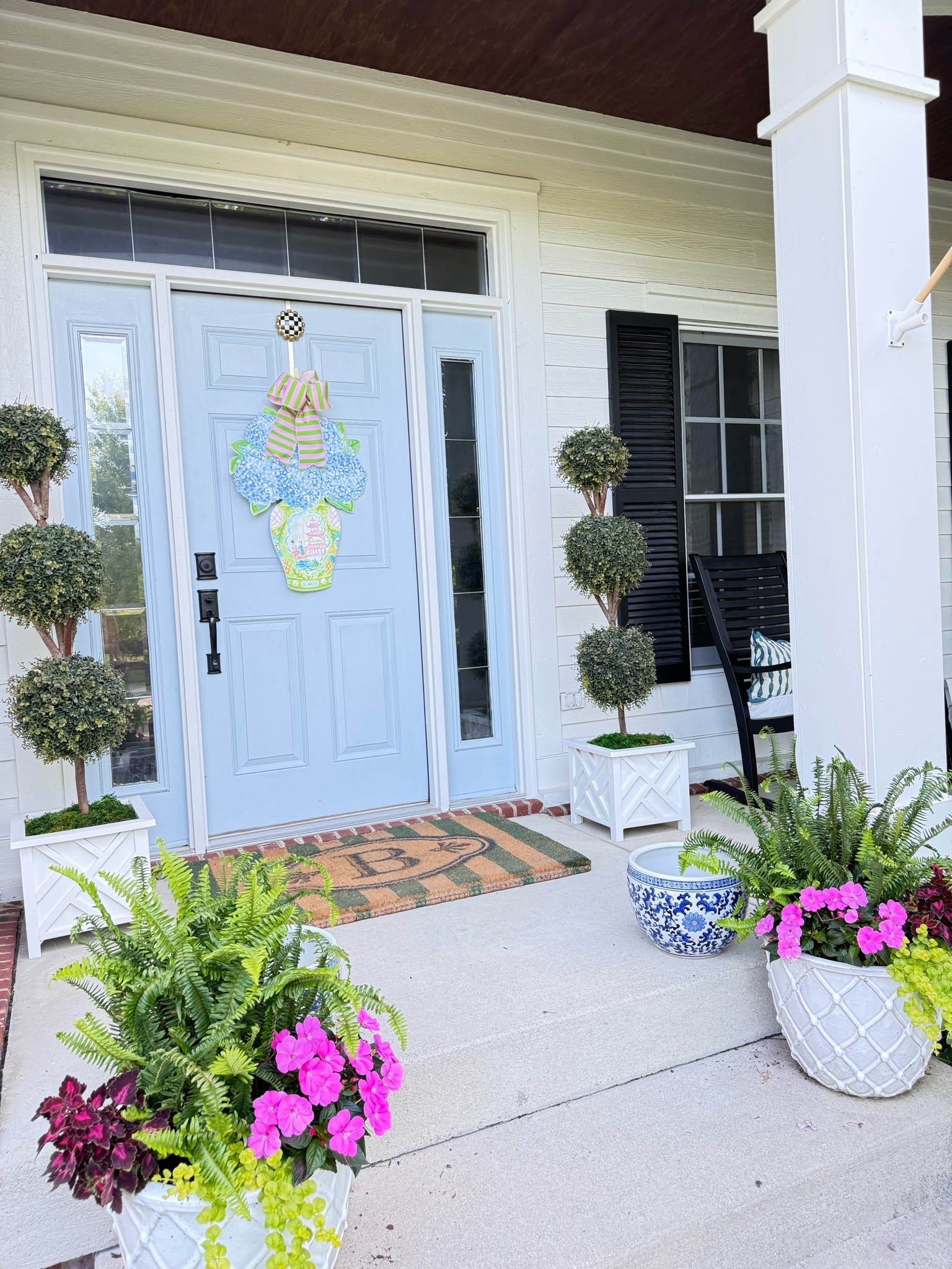 Front porch decor 🩵🇺🇸🌸🌷

Faux topiaries 🌳 I’ve had these for years, they are so good! Chippendale planter boxes. My go to moss for filler 💚

Front door mat

#LTKdayinmylife #LTKSeasonal #LTKHome