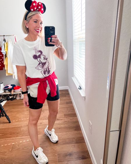 Disney outfit 
Minnie ears 
Disney ears 
Bike shorts 
Minnie Mouse tee - sized up to large for rear coverage with bike shorts 

#LTKfitness #LTKover40 #LTKfindsunder50
