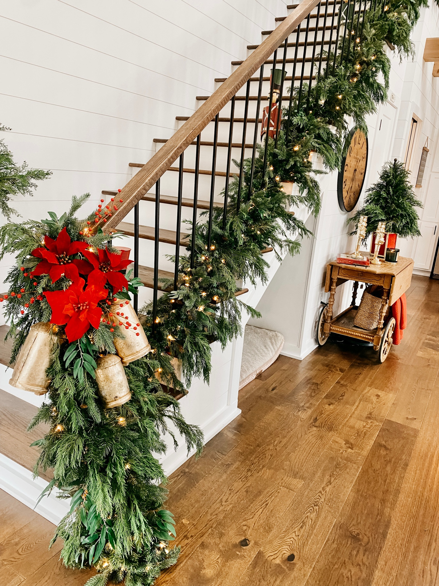 Layers and layers of garland! 
I started with this pre lit base garland from Walmart and added in a few other layers + real Cyprus stems to achieve this look ✨ 

#LTKSeasonal #LTKHoliday #LTKGiftGuide