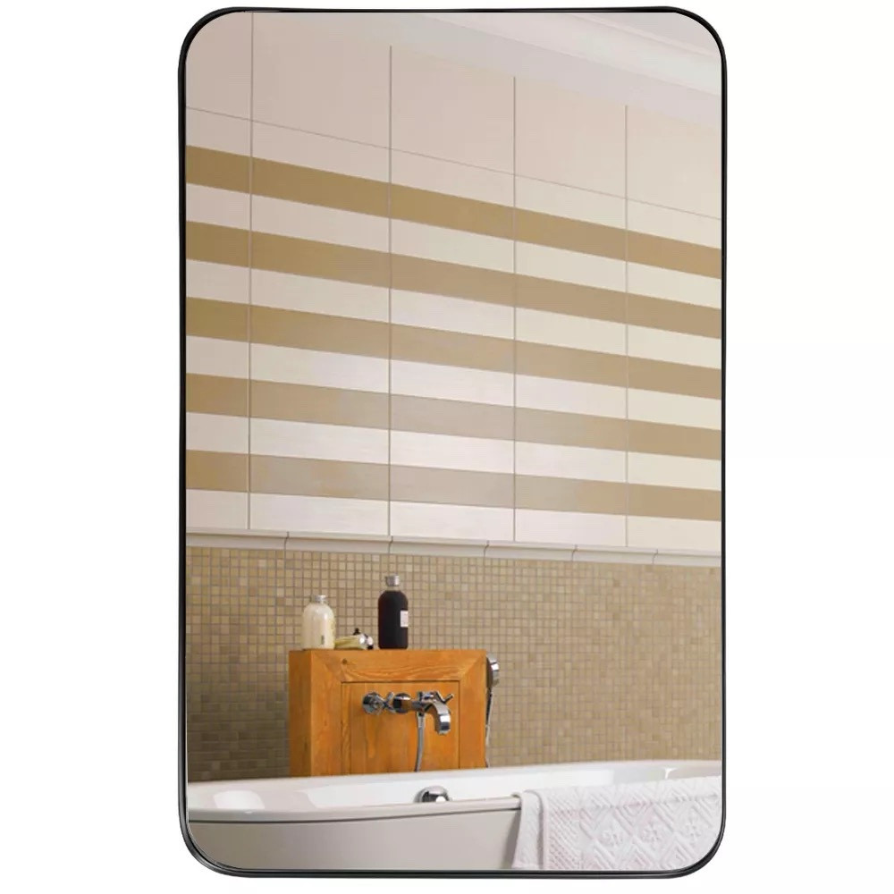 Such a unique retro styled rectangle mirror with a black metal frame! 32x30” and can be styled in several different ways for a unique mirror set up! 62% off on Target Circle Week❤️

#LTKSaleAlert #LTKSummerSales #LTKHome