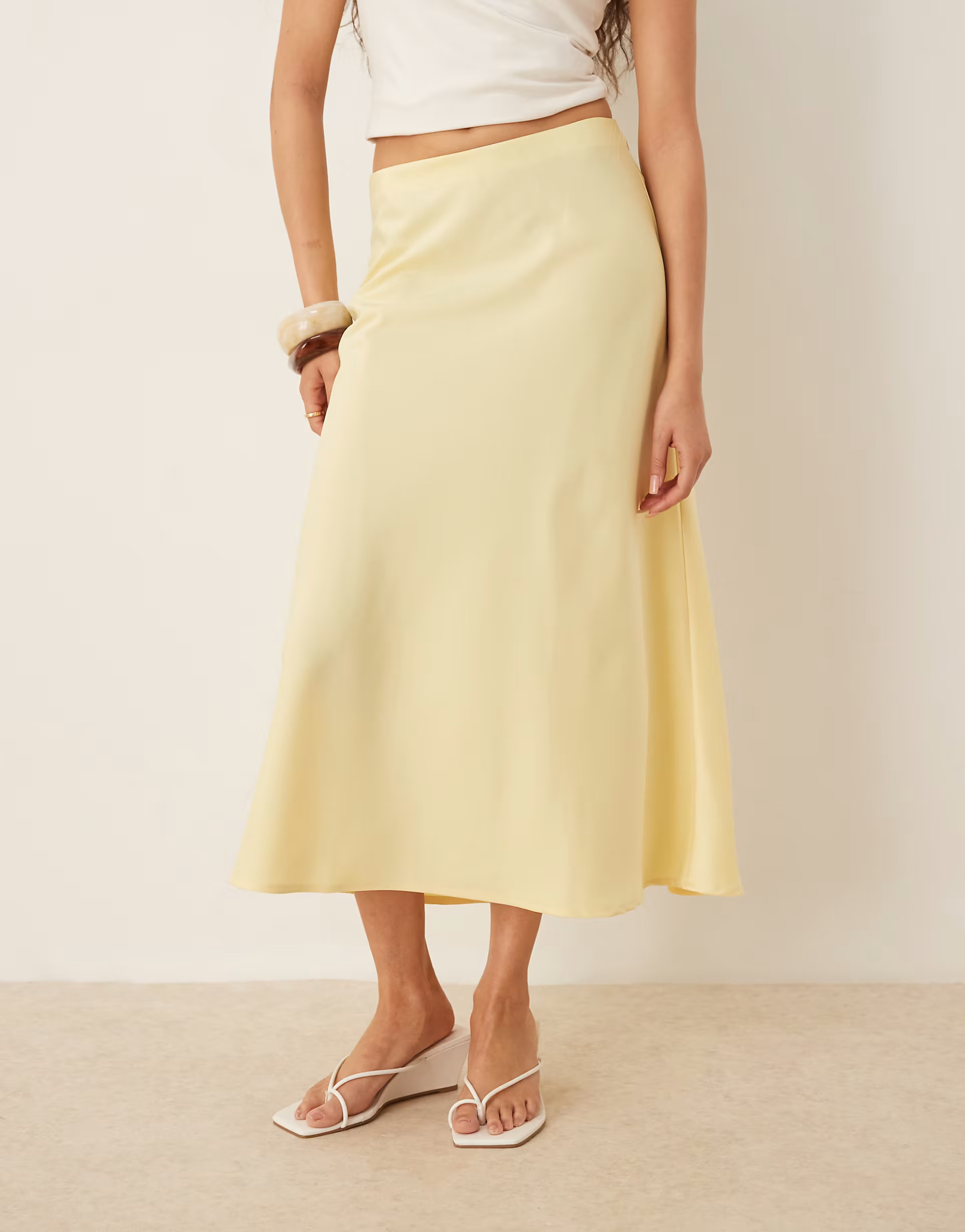 YAS satin midi skirt in pale yellow | ASOS | ASOS (Global)