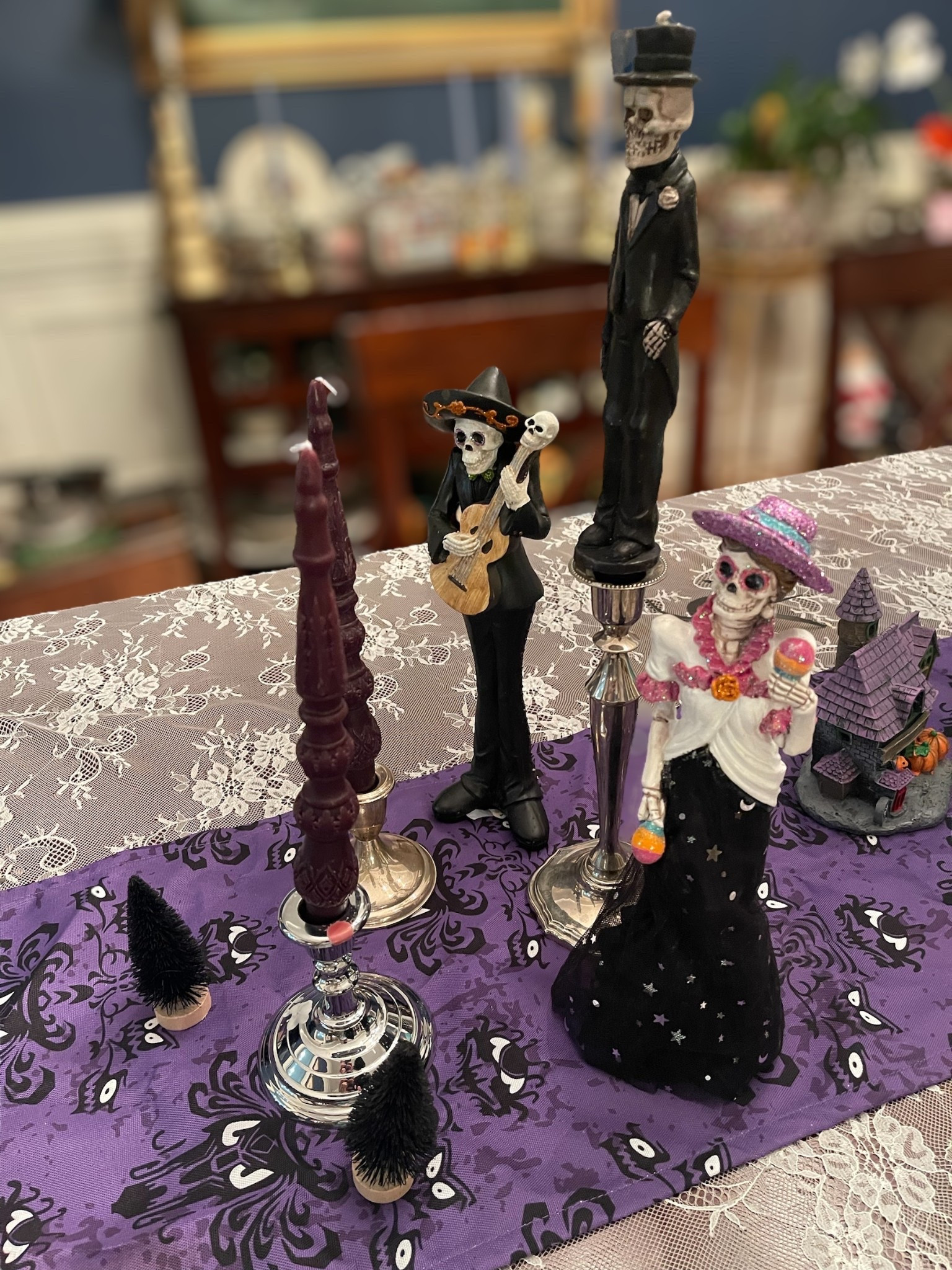 ✨🕯️ Transform your dining table into a hauntingly romantic Halloween tablescape with this gothic yet elegant setup! I layered a purple Halloween table runner with a vintage lace tablecloth to create a dramatic backdrop, then styled skeleton bride & groom figurines as the centerpiece 💀💜. Black and purple taper candles in silver candle holders bring the perfect moody glow, while skeleton details tie everything together for a chic Day of the Dead–inspired wedding theme. 🎃🖤

This look is perfect for a Halloween dinner party, gothic wedding décor, or spooky fall entertaining—mixing glam, romance, and just the right touch of creepy fun!

🛒 Shop the look:
	•	Skeleton bride & groom figurine centerpiece
	•	Skeleton taper candles
	•	Black & purple unscented taper candles
	•	Silver candle holders
	•	Halloween table runner
	•	Lace tablecloth

💀🎃 
Halloween tablescape décor • spooky table setting • skeleton wedding centerpiece • gothic Halloween party ideas • Day of the Dead table décor • purple & black Halloween theme • skeleton bride & groom decorations • elegant Halloween dining table • gothic glam Halloween inspiration


#LTKFindsUnder100 #LTKHome #LTKFindsUnder50

#LTKFindsUnder100 #LTKFindsUnder50 #LTKHome