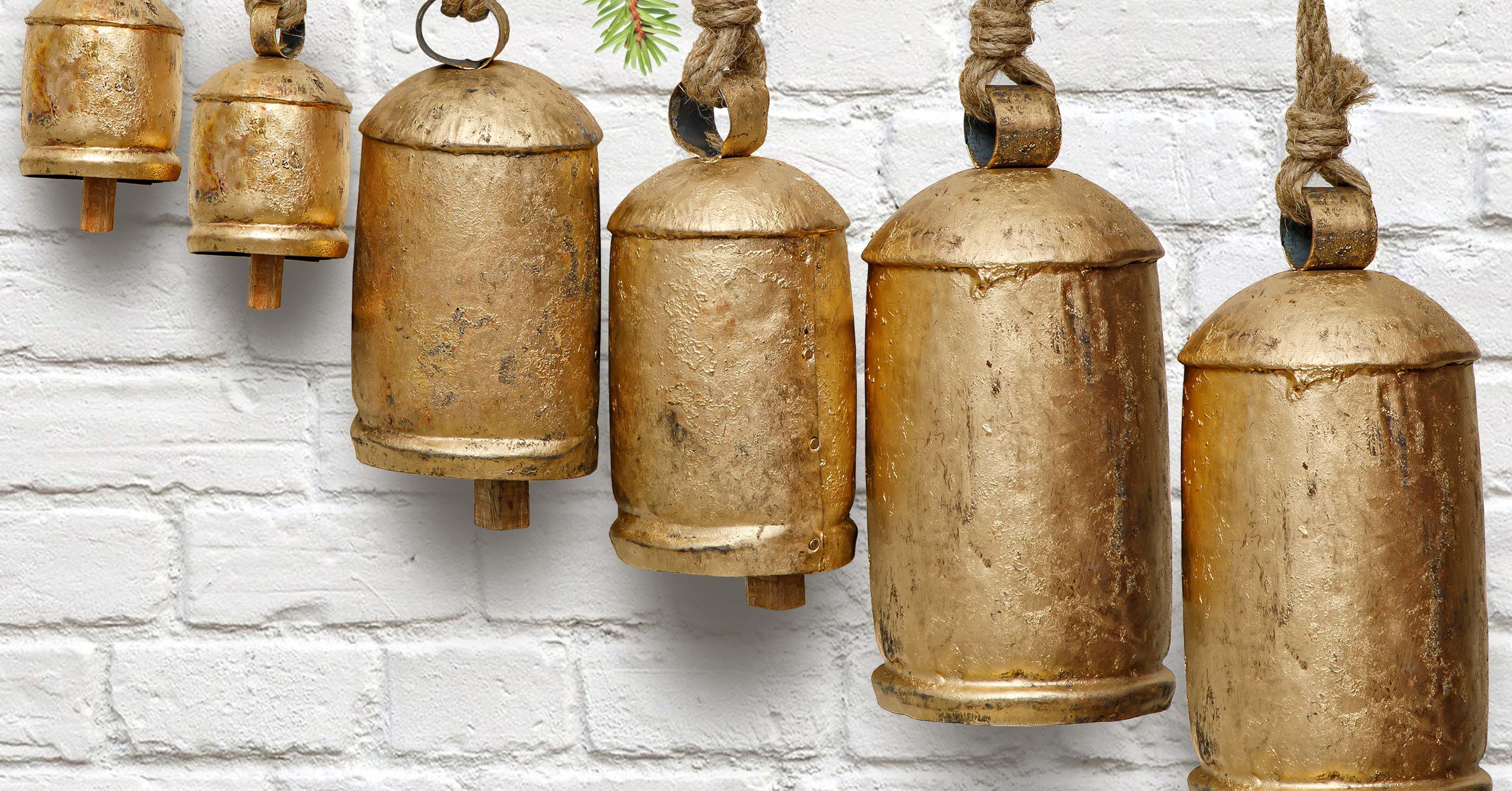 Deco 79 Gold Metal Tibetan Inspired Decorative Giant XL Cow Bells with Jute Hanging Rope, Set of 3 10",8",6"H - Cylindrical | Amazon (US)