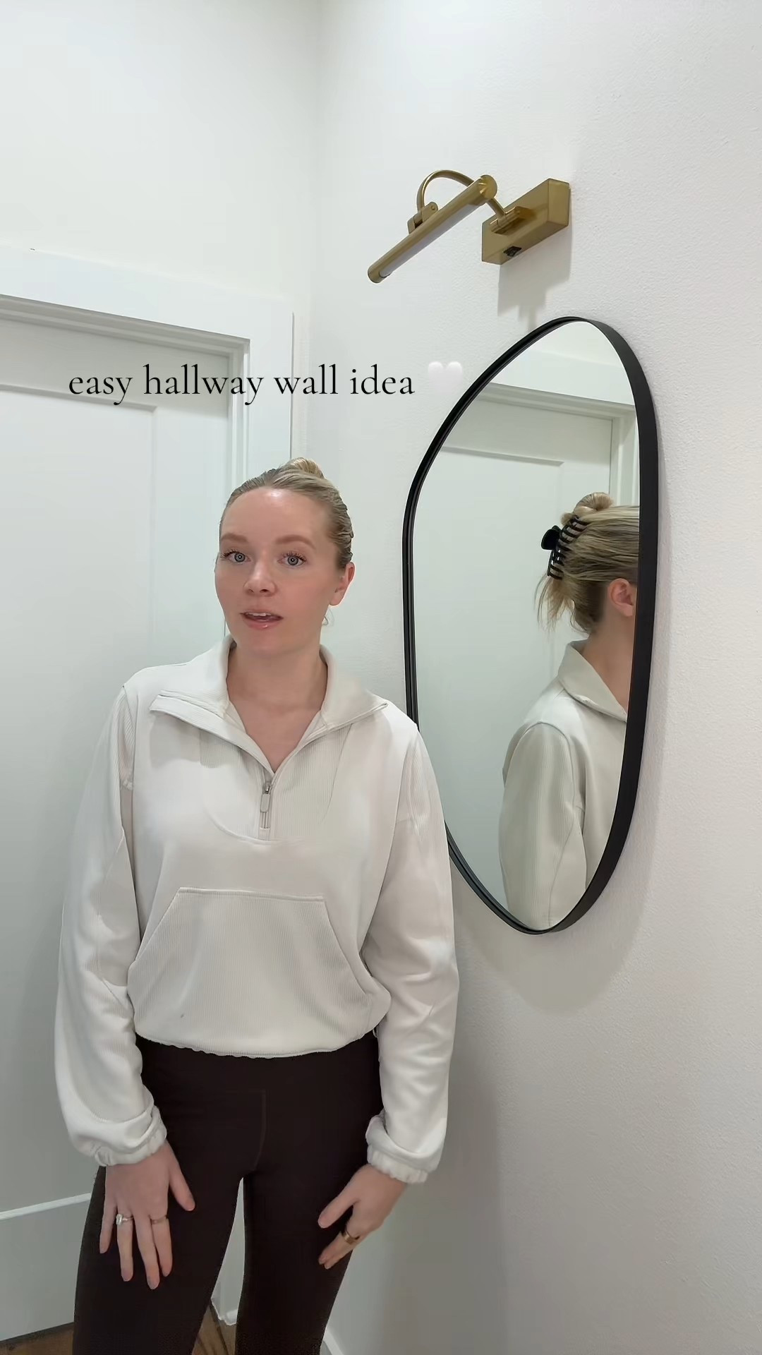 If you have a blank hallway wall, this is such an easy way to make it feel more finished.

A mirror + rechargeable picture light adds warmth and interest without a big project.

Everything is linked here 🤍

#LTKHome #LTKSaleAlert