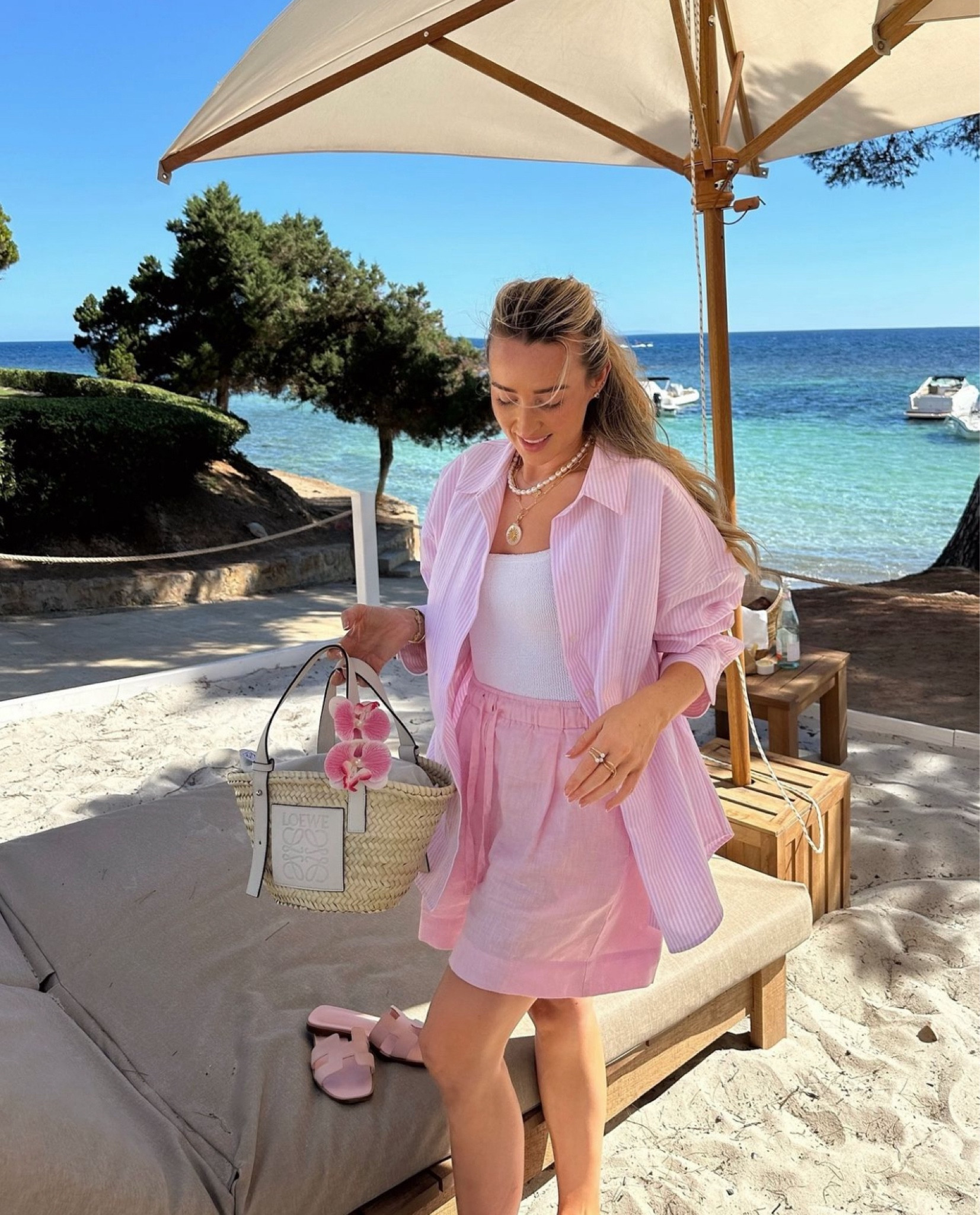 Pretty in pink this summer 💕 pink, stripes and linen is the perfect combination for Ibiza! These linen shorts are super comfortable over my Hunza G white swimsuit, perfect beach casual cover up look

#LTKluxury #LTKeurope #LTKsummer