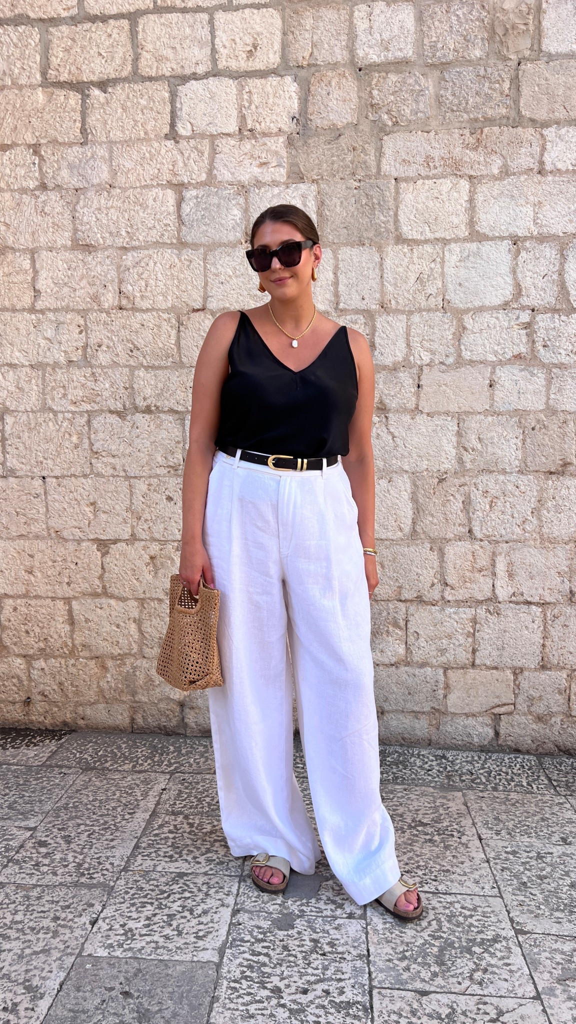 Classic, effortless, and forever chic 🖤🤍 a black tank + white linen pants combo I’ll wear on repeat—polished enough for dinner, comfy enough for sightseeing, and so easy to mix and match.

Keywords: black tank outfit, white linen pants, summer capsule wardrobe, vacation outfit, European summer style, neutral outfit, effortless chic outfit, linen pants outfit, minimalist summer look, travel outfit

#LTKWorkwear #LTKootd #LTKTall