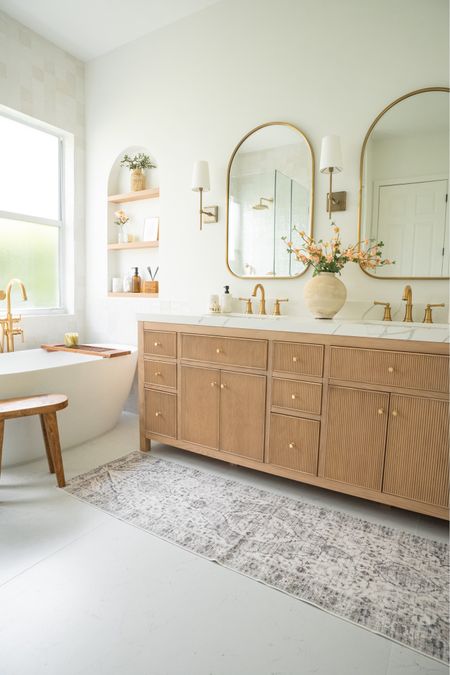 Primary Bathroom Links! My FAVORITE vanity, washable rug, free standing tub and all our bathroom accessories



#LTKhome