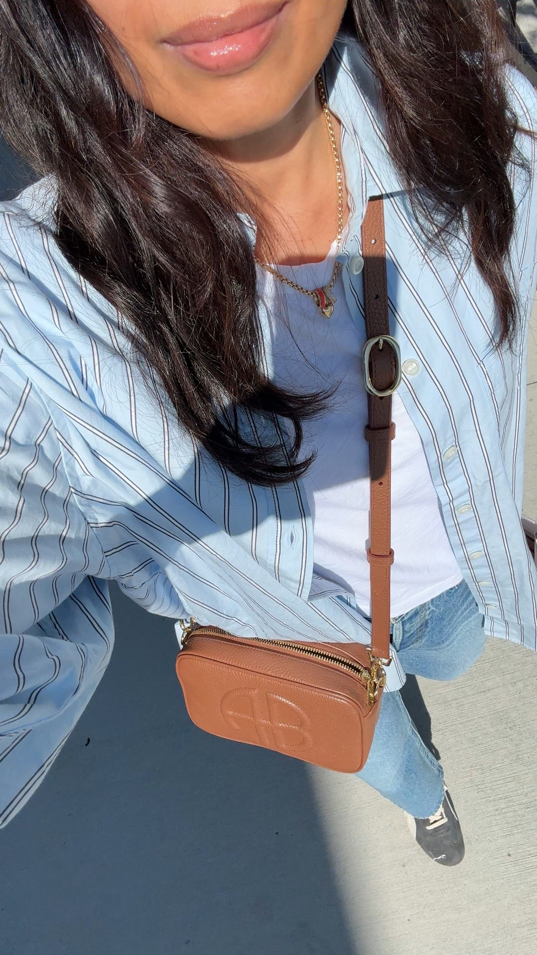 Easy everyday Fall layered look: shirt as a jacket. 
I haven’t pulled out a real jacket yet and have been layering up in the mornings with an oversized button down shirt instead. 
- This exact oversized button down has the best fit. Truly oversized in your true size and I love that. Long enough to cover for leggings too. Size down for a more classic fit. Multiple colors available. 
Currently on sale.
- Linking my current favorite options for good cotton t-shirts. 
- Favorite 90s relaxed straight leg jeans. I size up. 
- Suede sneakers in an eye catching washed gray color. Cool, vintage-vibe. Nice neutral with edge. Comfy fit. True to size. 
- Necklace that elevates a simple tee. 
- Classic leather crossbody bag in neutral brown. 
- Mixed metals bangle bracelets go casual to dressy. 
- The Rhode products come in beautiful shades. The lip products ended up drying out my lips, but I love the blush. I have shades tan line and toasted teddy  


#LTKOver40 #LTKFindsUnder100 #LTKBeauty