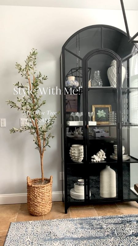 My best selling olive tree is on sale! More than 50% off! Shop from favorite retailer, baskets, Spanish moss, black display cabinet, home decor across. Free shipping. Amazon home, Nearly Natural, Crate & Barrel, Target. 

#LTKsalealert #LTKVideo #LTKhome
