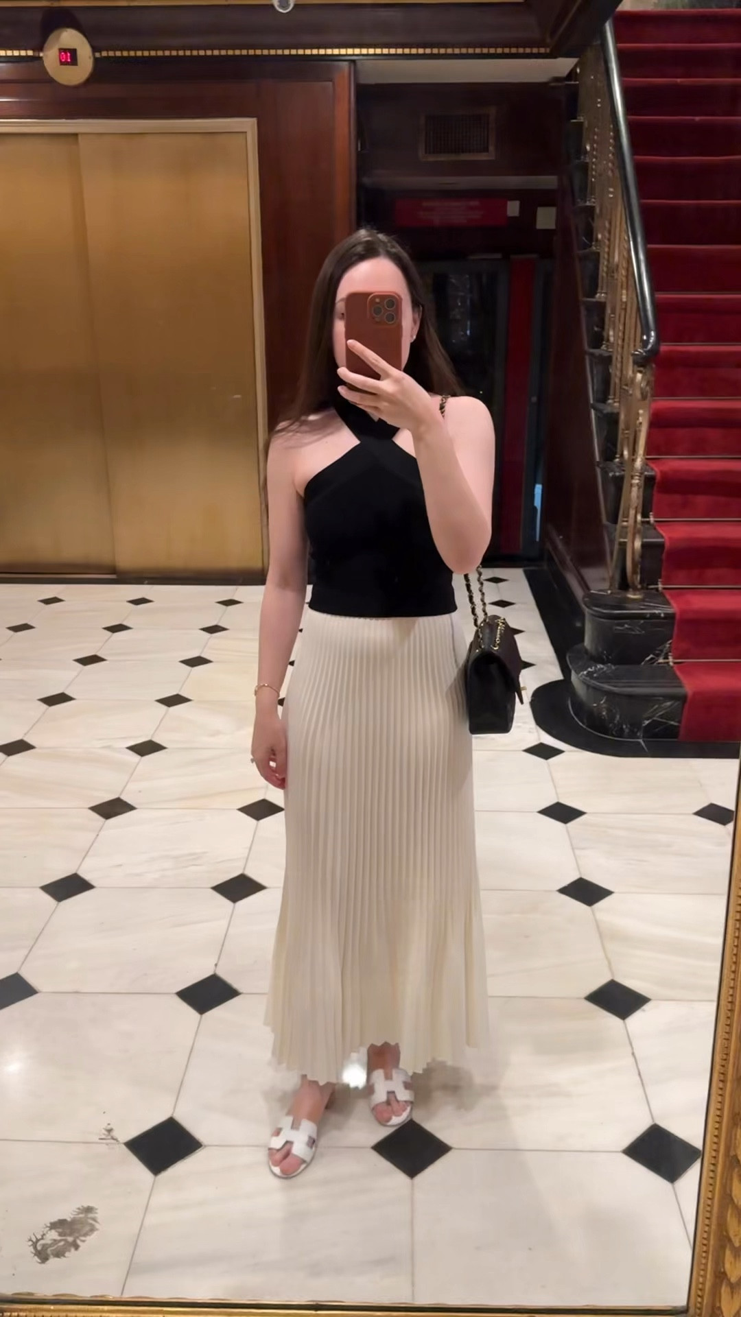 Black halter top and pleated white maxi skirt. Summer dressy brunch look
#chanel #aritzia #hermes

#LTKfindsunder100 #LTKtravel #LTKstyletip