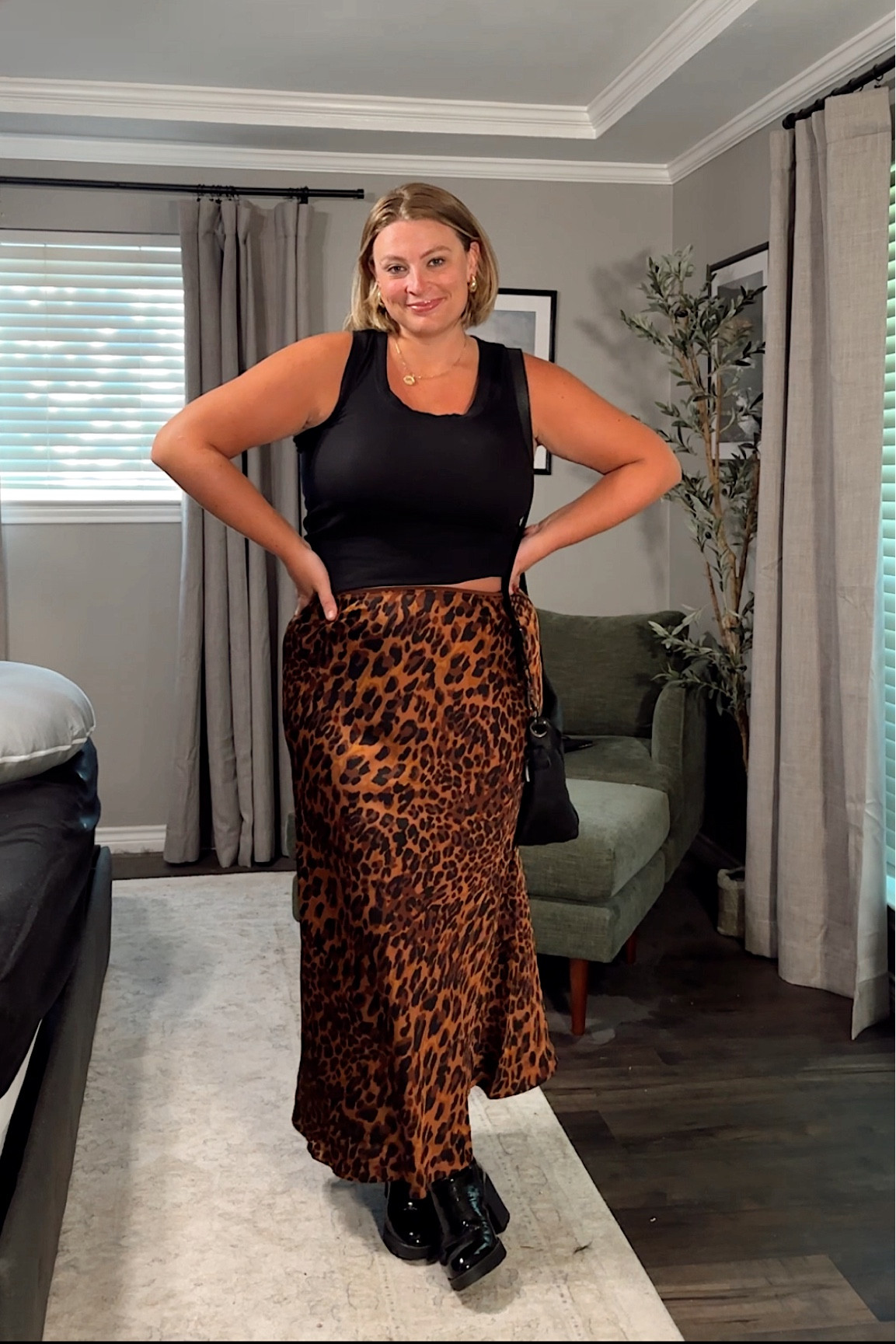 Non maternity but bump friendly early fall outfit idea. I sized up in the leopard skirt to XXL to accommodate growing bump, otherwise would have done my most usual size xl. Comes in XS-4x. Also linking black tank top and similar boots 

#LTKMidsize #LTKPlusSize #LTKBump