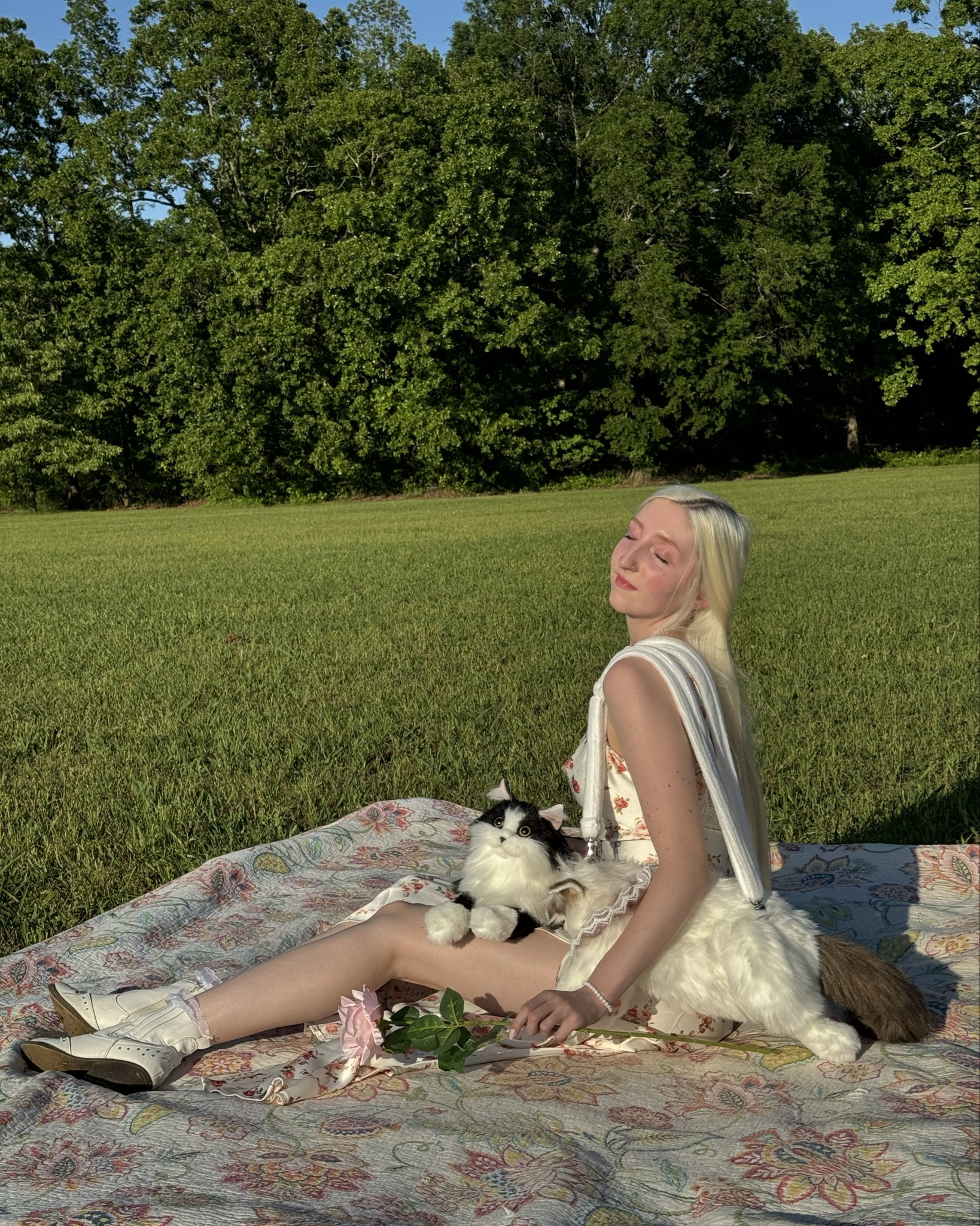 Wearing a beautiful white satin dress with a floral print, along with white boots, and ruffle socks. Also, wearing an adorable cat purse! The black cat is a weighted plush! Pretty dresses, boots, and the two cats are linked below! 💕

#LTKSummerSales #LTKFindsUnder100 #LTKSaleAlert