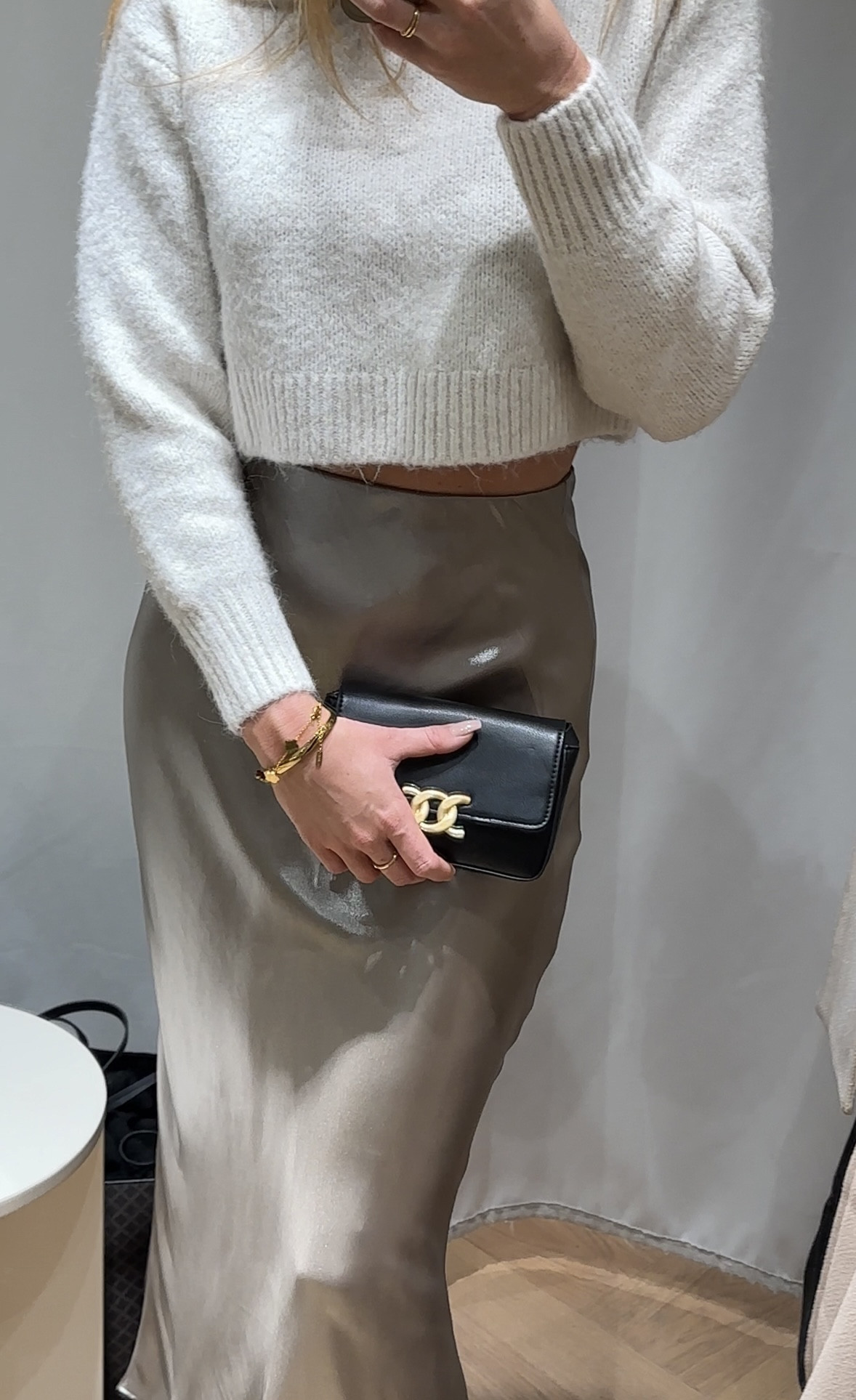 H&M - satin skirt, cropped knitwear and little black bag. 

#LTKSeasonal #LTKstyletip #LTKeurope