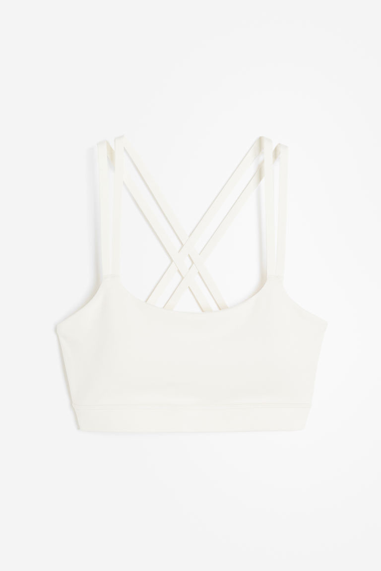 H & M - Light Support Sports bra in SoftMove - White | H&M (UK, MY, IN, SG, PH, TW, HK)