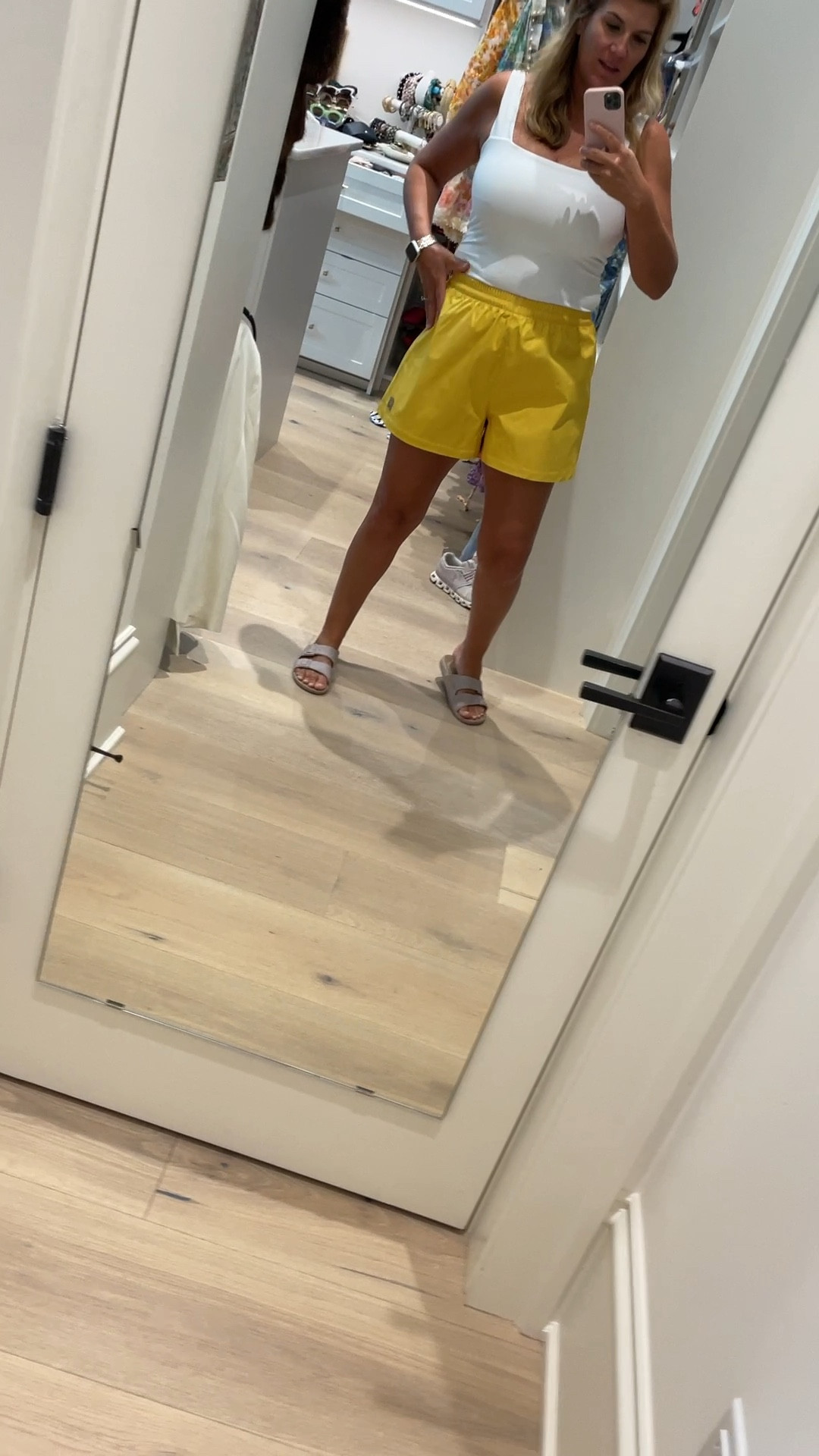 Yellow sports shorts from Tory Burch 

#LTKFitness