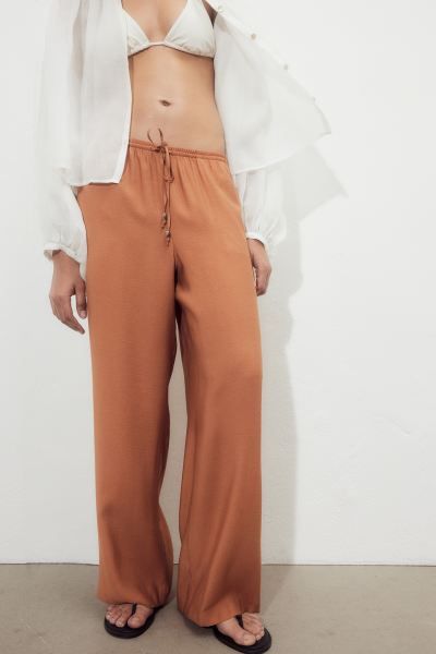 Wide pull-on trousers - Regular waist - Long - Light brown - Ladies | H&M GB | H&M (UK, MY, IN, SG, PH, TW, HK)