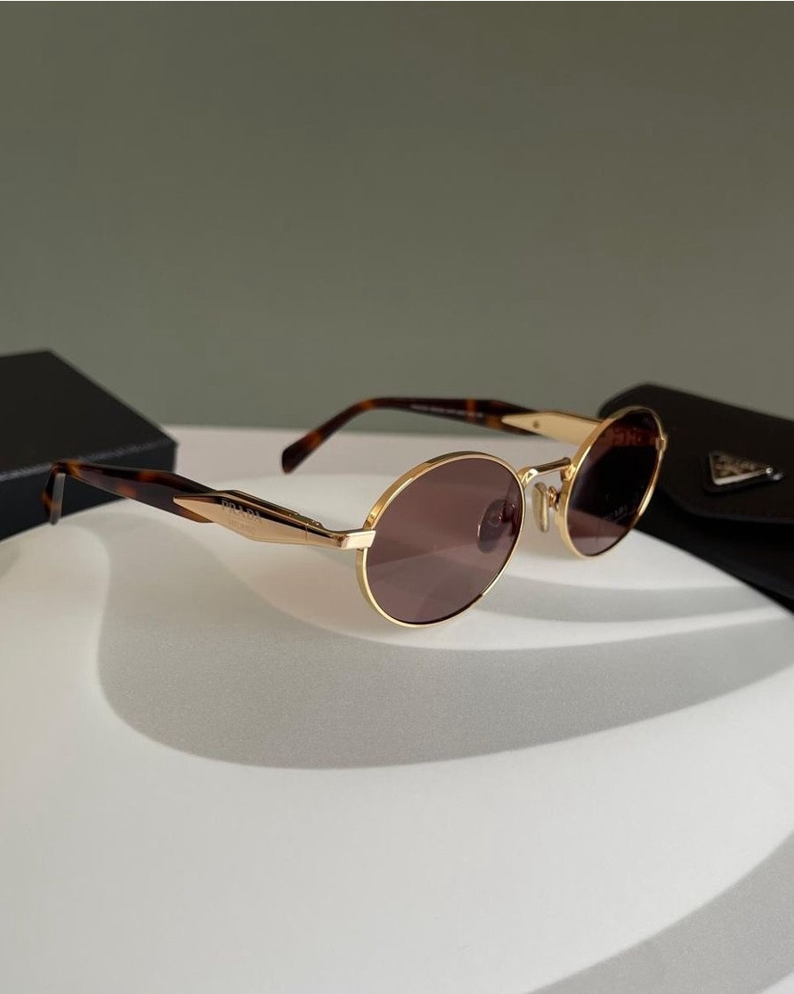 Prada sunglasses. Comes in multiple colours with different frame shapes. 

#LTKstyletip #LTKspring #LTKsummer