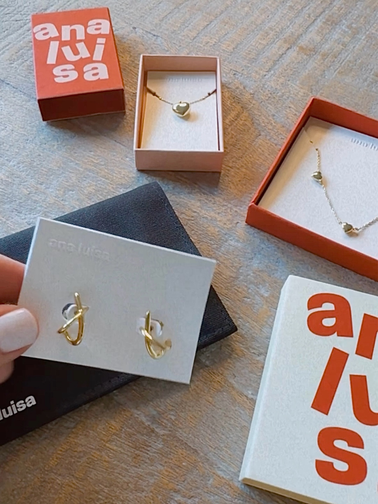 Ana Luisa jewelry. Small dainty gold earrings and heart necklace. 