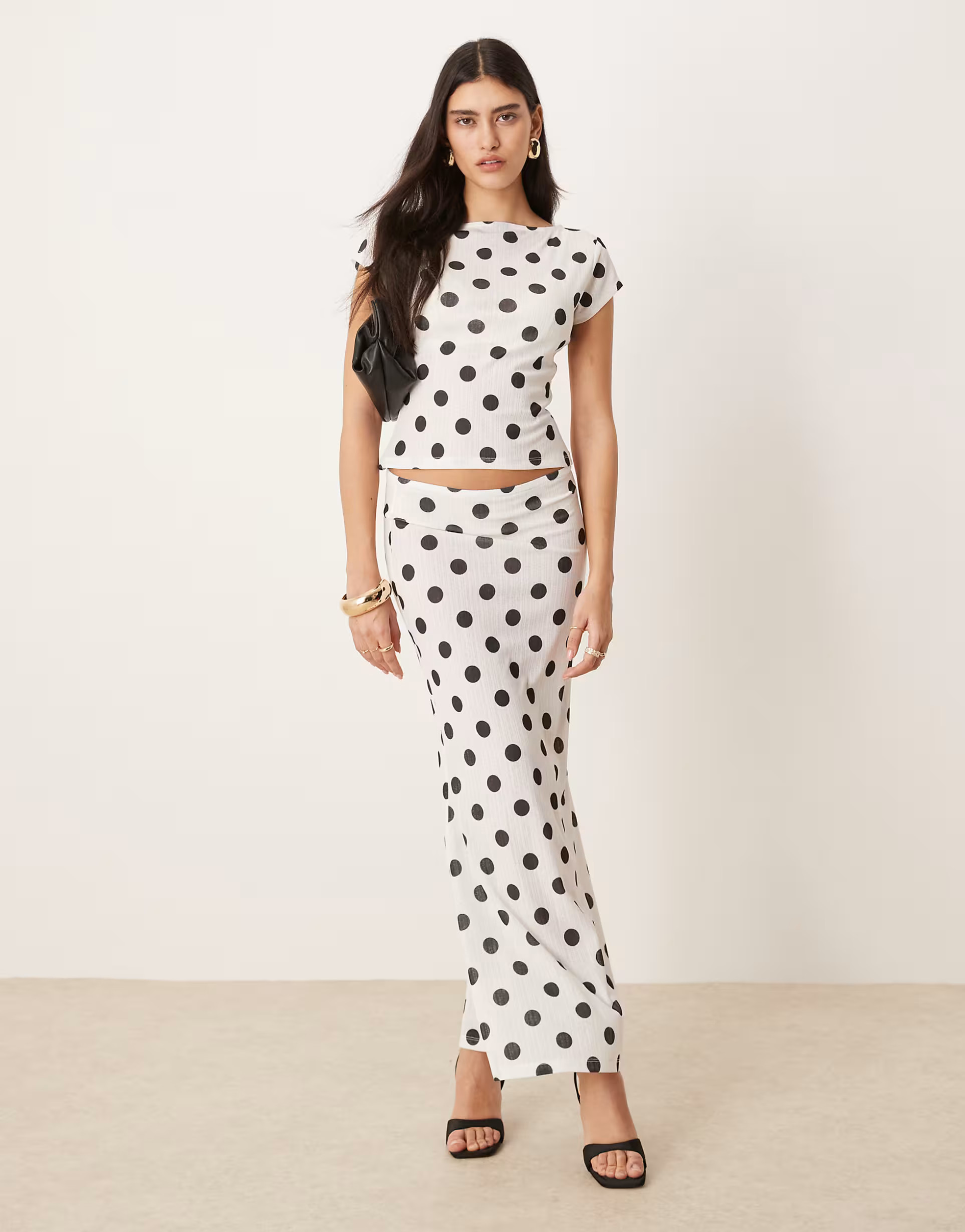 ASOS DESIGN polka dot printed dry handle rib maxi low rise skirt in ecru | ASOS (Global)