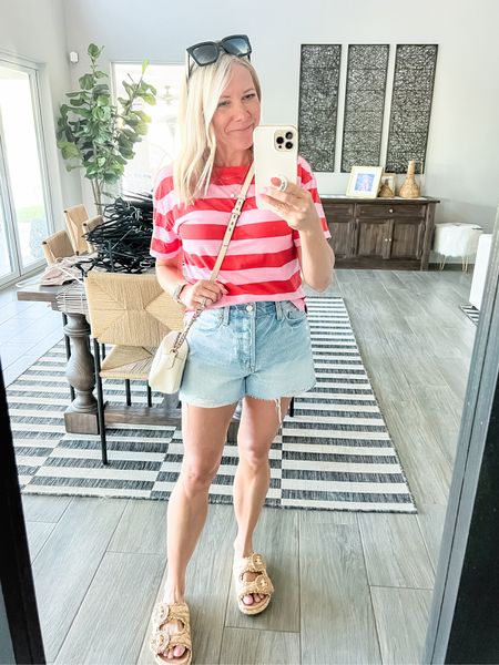 Love this striped T-shirt with denim shorts and sandals. XS tee, 26 shorts (order your true denim size and 8 sandals. Jean shorts summer outfit ideas 

#LTKstyletip #LTKSeasonal #LTKover40