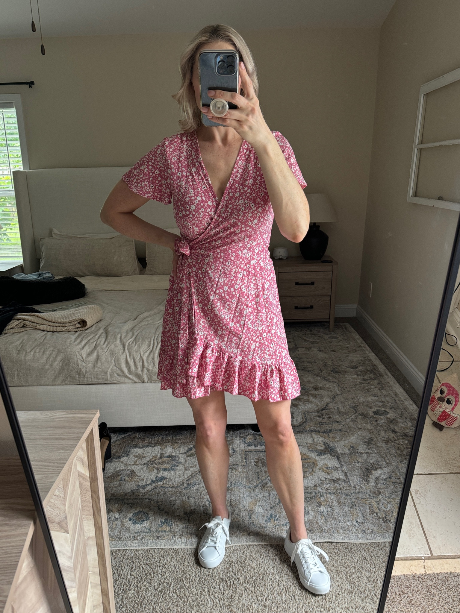 Pink and white floral wrap dress, white sneakers  

#LTKFindsUnder50 #LTKStyleTip