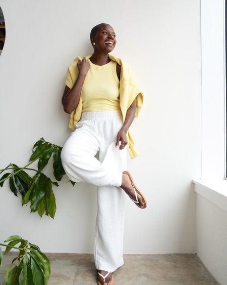 Spring outfit! Pull on white linen pants, yellow tank and yellow crewneck sweatshirt. Easy and so cozy! Great travel look too!

#LTKfindsunder50 #LTKtravel #LTKfindsunder100