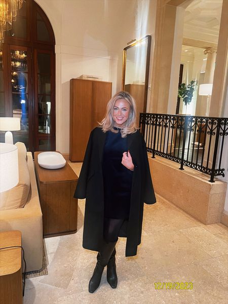 Holiday look; long wool black coat; holiday velvet navy sheath dress; 2023 holiday outfit ideas 