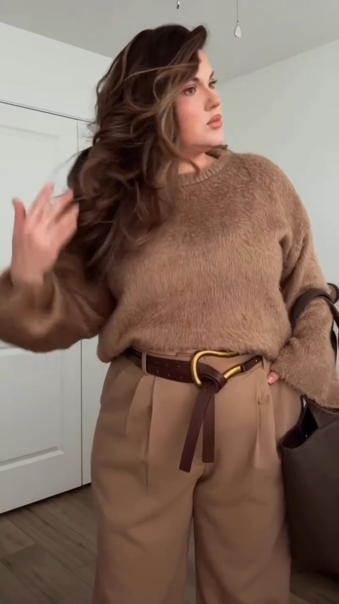 Sweater: XL (she’s very fuzzy!)
Trousers: 33R (I’m 5’6”)


First day wearing real pants in 2026 🎉😂 If you’re feeling like you don’t know what to wear to the office, this is an outfit formula I always go back to and it’s super simple to recreate. Choose a sweater in the same color or tonal family as your trouser, add a belt with a little extra detail (think metallic touches, a buckle interesting shape like this one, etc), and yes girl we are still matching our belt to our shoes sometimes when it feels right! Keeping everything tonal makes this outfit feel cohesive and put together but it is so so easy to throw on and go.


#workwear #curvyfashion #midsizefashion #outfitinspiration #outfitinspo

#LTKMidsize #LTKgrwm #LTKWorkwear