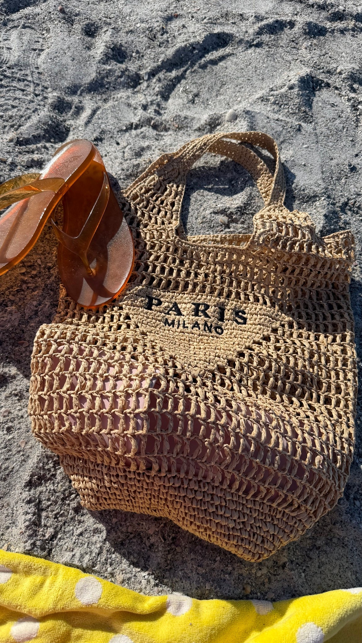 My most worn pieces on every vacation is this beach bag, my hat and these flip flops 