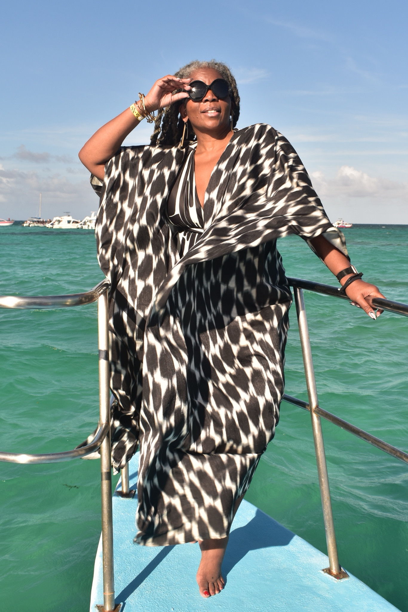 I love this look.  The bathing suit is an infinity suit and can be worn strapless or with more coverage.  There’s also a matching skirt to create a dress look.  And the kimono is so versatile, and can be worn with jeans, shirts or as a dress. Definitely classic pieces I’ve worn again & again.  

#LTKSwim #LTKStyleTip #LTKSeasonal