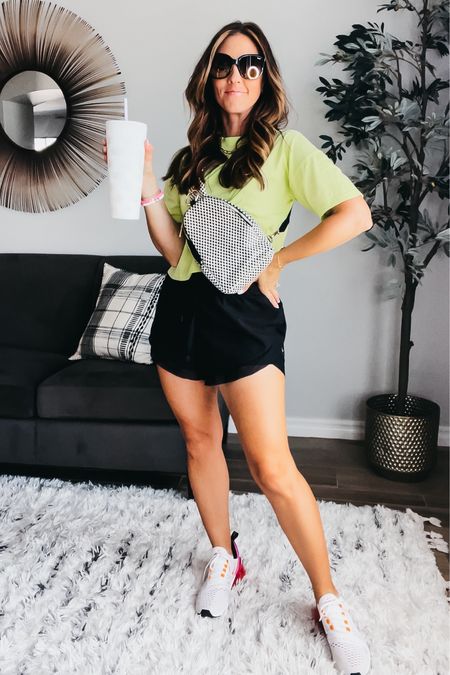 Neon green cropped, boxy tee - wearing size small 💚 I also have it in blue, pink, black, and white!
size small black athleisure shorts 🖤checkered sling bag
Nike running shoes 
QUAY sunglasses 

#LTKsalealert #LTKstyletip #LTKActive