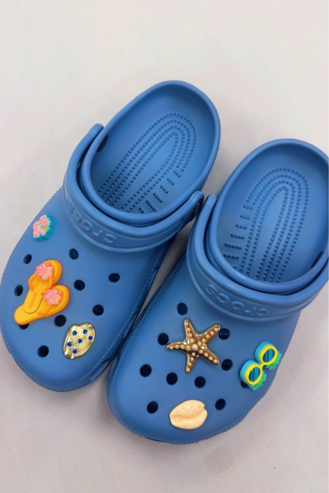Beachy blue crocs💙 summer shoes, summer style, beach outfits, summer outfit inspo, vacation outfit ideas, Astro blue crocs and tropical jibbitz 

#LTKootd #LTKSaleAlert #LTKSeasonal