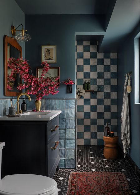 I am super happy with how this design came together. The blue bathroom at the Loft House is such a statement. 

#LTKhome