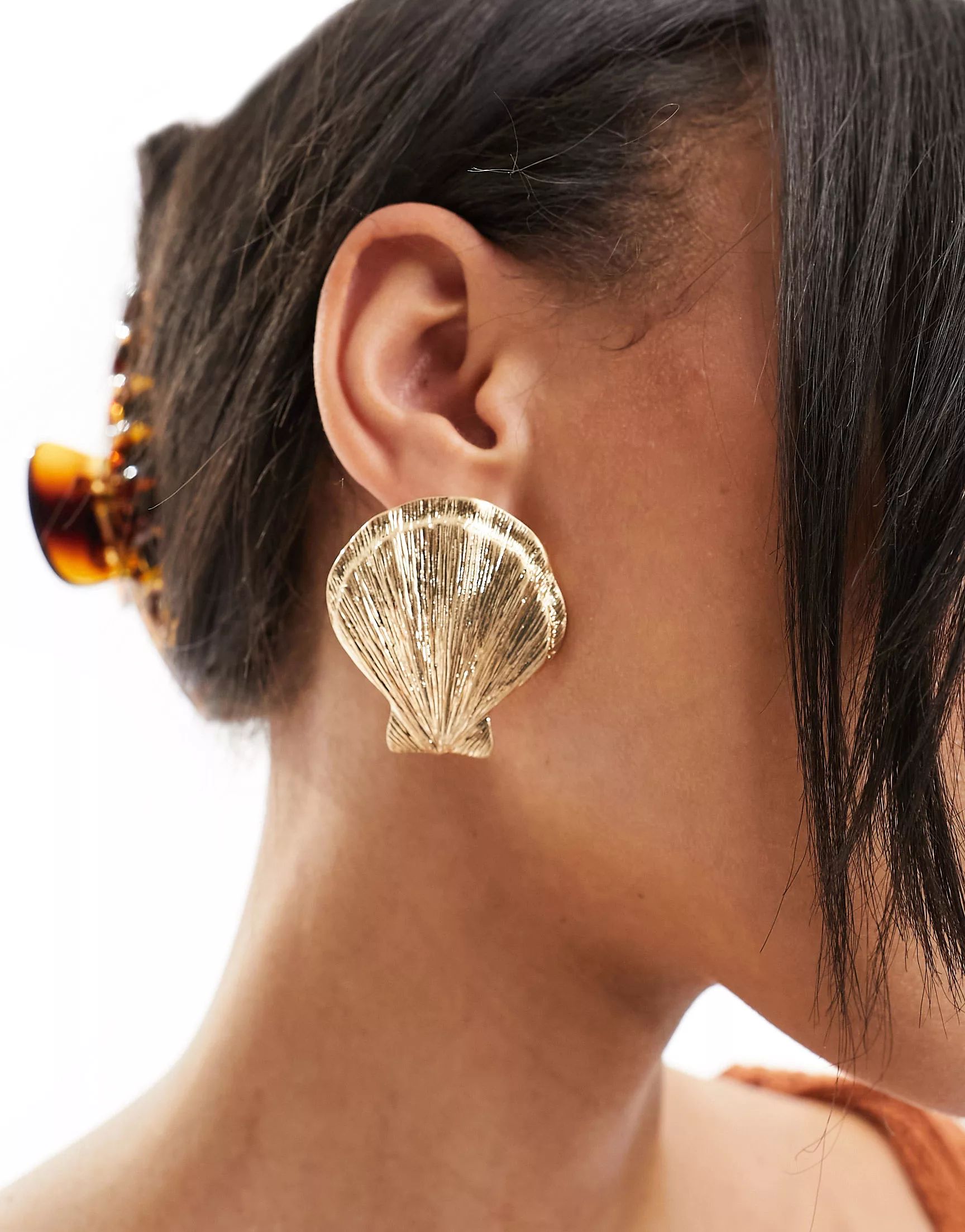 ASOS DESIGN stud earrings with shell design in gold tone | ASOS (Global)