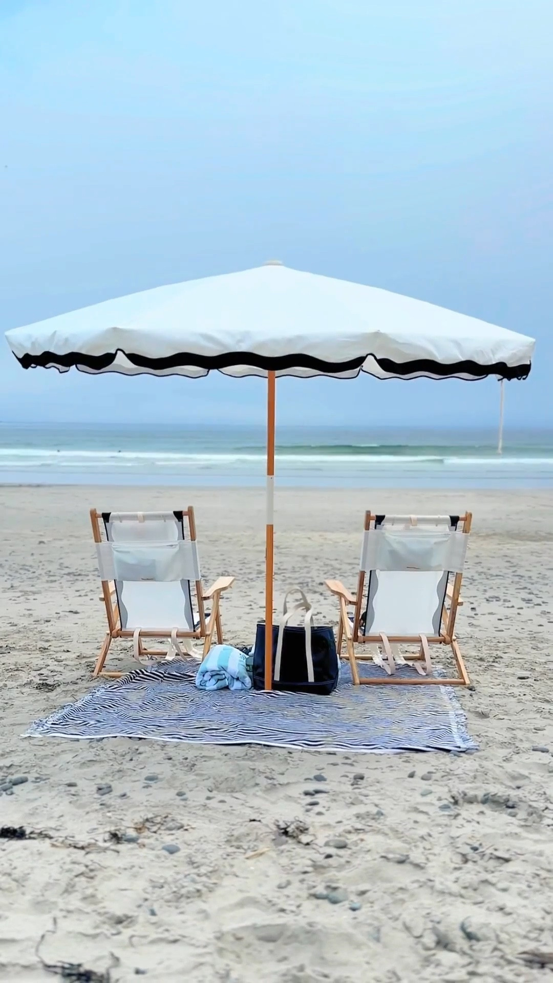 Our beach gear, beach chairs, beach umbrella, beach blanket, beach towels, beach tote 

#LTKHome #LTKSeasonal #LTKTravel