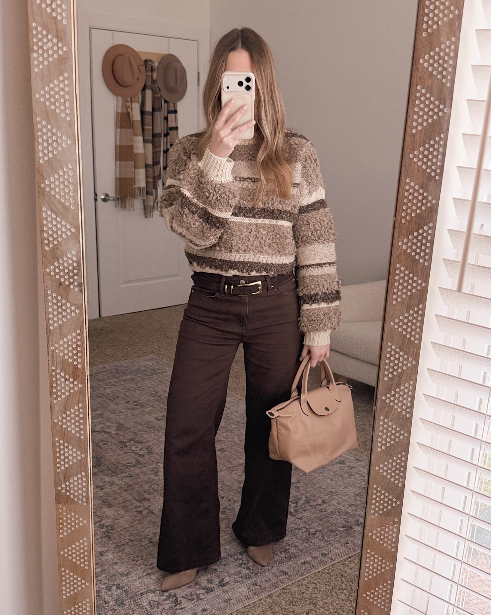 This striped sweater is one of those easy winter pieces that feels cozy but still pulled together. I love it with brown denim and neutral accessories for a polished everyday look that works for errands or casual plans.

winter outfit women over 40, winter sweater outfit, striped sweater winter outfit, brown denim outfit women, neutral winter outfit, casual winter style women, winter capsule wardrobe, everyday winter fashion

#LTKOver40 #LTKdayinmylife #LTKFindsUnder100