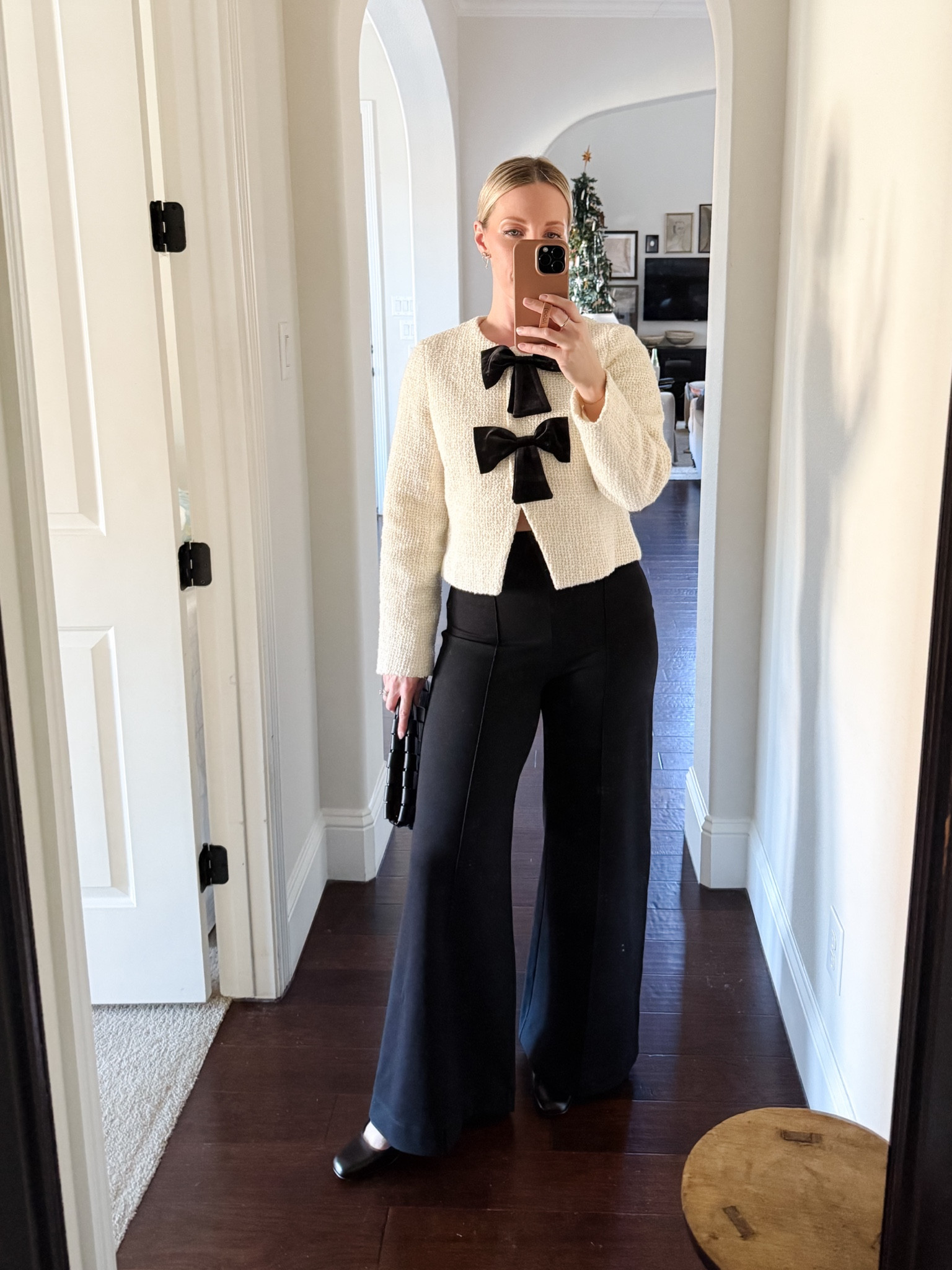 This bow front lady jacket is back in stock!  Love it for holiday parties, NYE, or a dressy date night.  Pairing with the most comfortable wide leg pull on pants you will ever find.

#LTKHoliday #LTKOver40