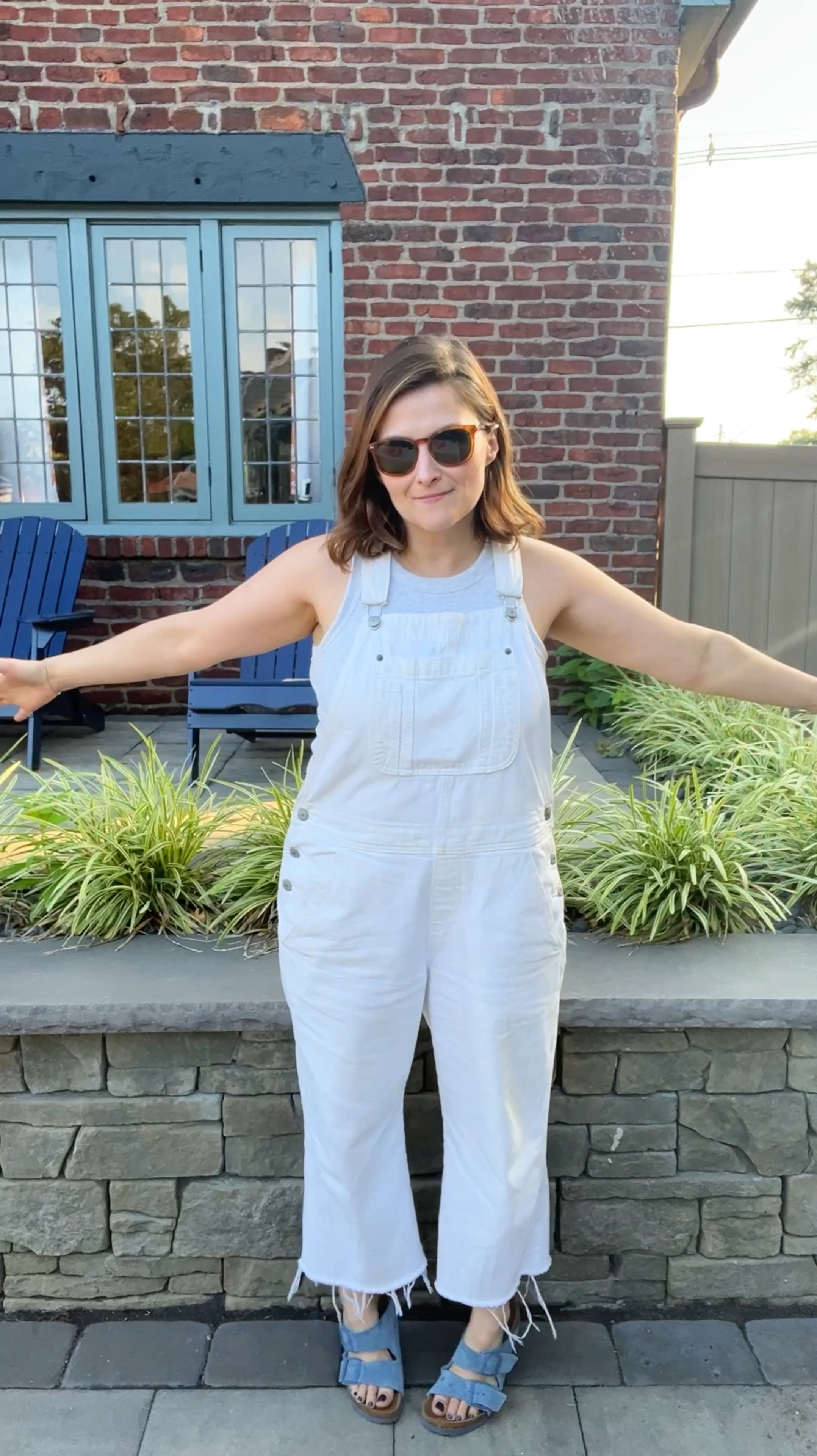 Sale 🚨 40% off!!! 🕶️ Just over here… living the overall life! 🤣I’ve put these white overalls through the literal ringer this summer. Endless bleaching and washings and drying on high heat. I cut a few inches off the bottom myself. Size: Petite 10. I’m 5’2 and 145lbs. I sized up bc I wanted a looser fit and I wanted to be able to wash them without worrying about shrinking. I feel like the more I wash these the better they fit. 

#LTKVideo #LTKFindsUnder50 #LTKMidsize