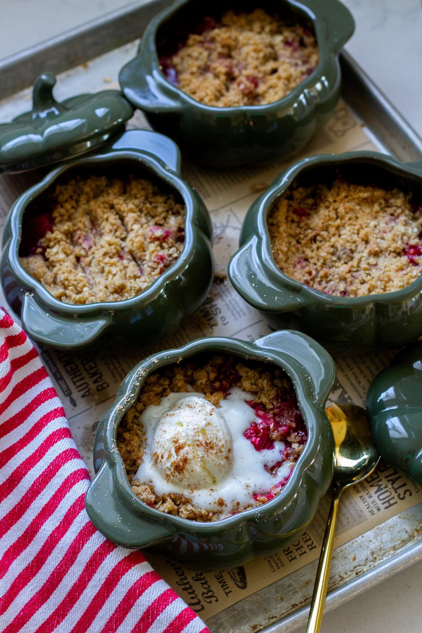 Grab this delicious recipe for berry rhubarb crisp on Handmadefarmhouse.com and shop my darling pumpkin cocottes below